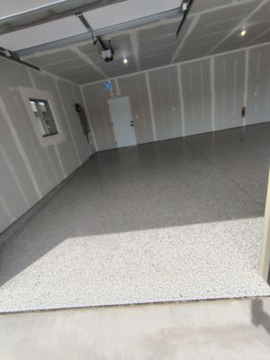 Speckled Epoxy Garage Floor Coating Installation in Sioux Falls