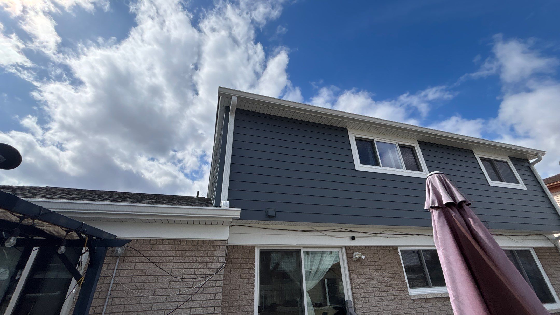 Siding Replacement using Alside Midnight Blue by 180 Contractors