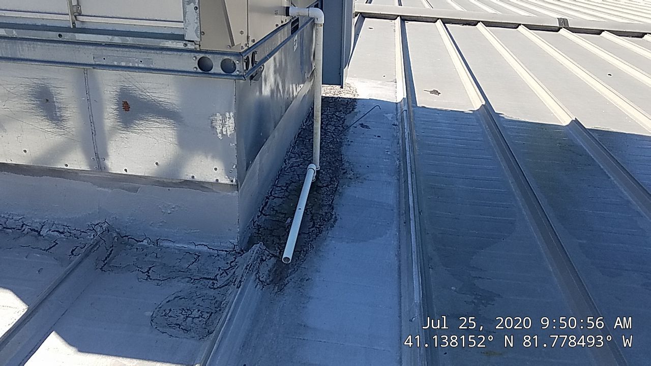 Commercial Metal Roof Coating by Gold Star Roofing LLC