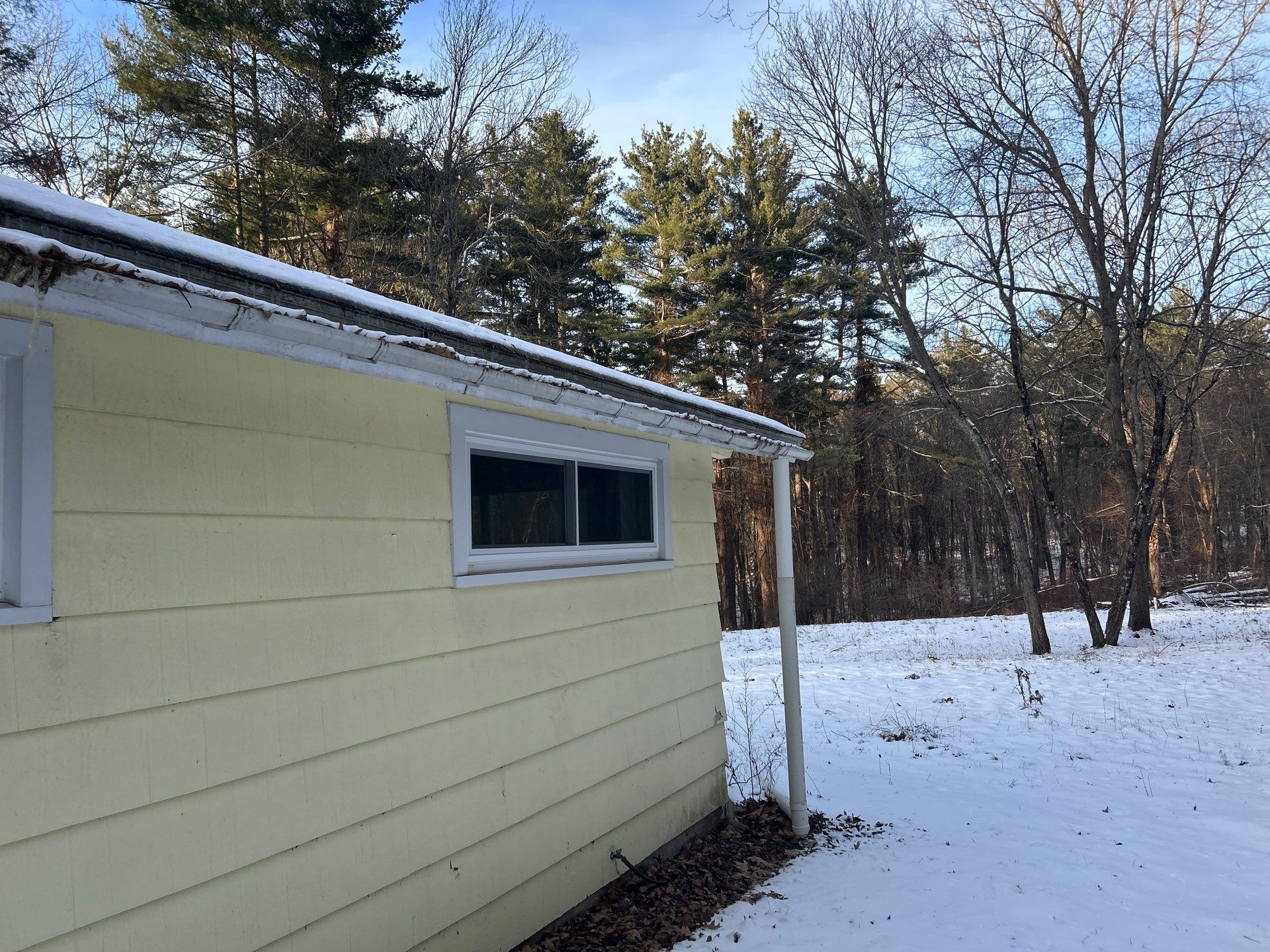 Gutter Installation Project in Stow by Mighty Dog Roofing of Greater Middlesex County