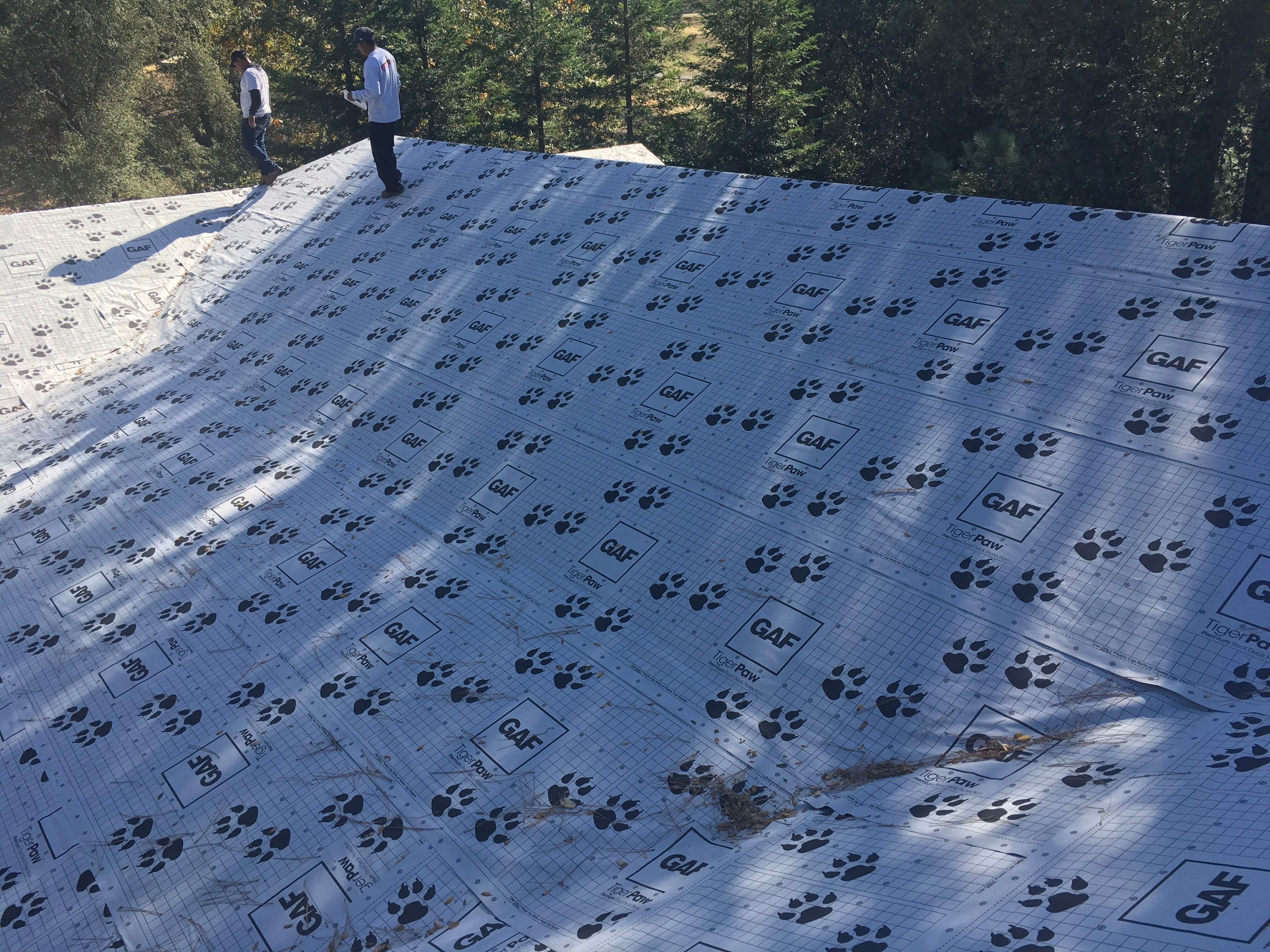 Metal roofing installation using Standing seam metal roofing system by Straight Edge Roofing Inc