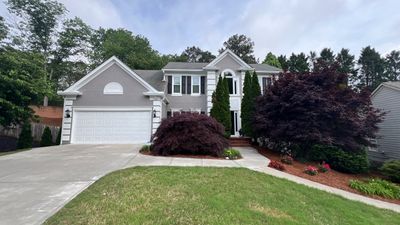 Full Exterior Siding Replacement and Custom Deck in Johns Creek