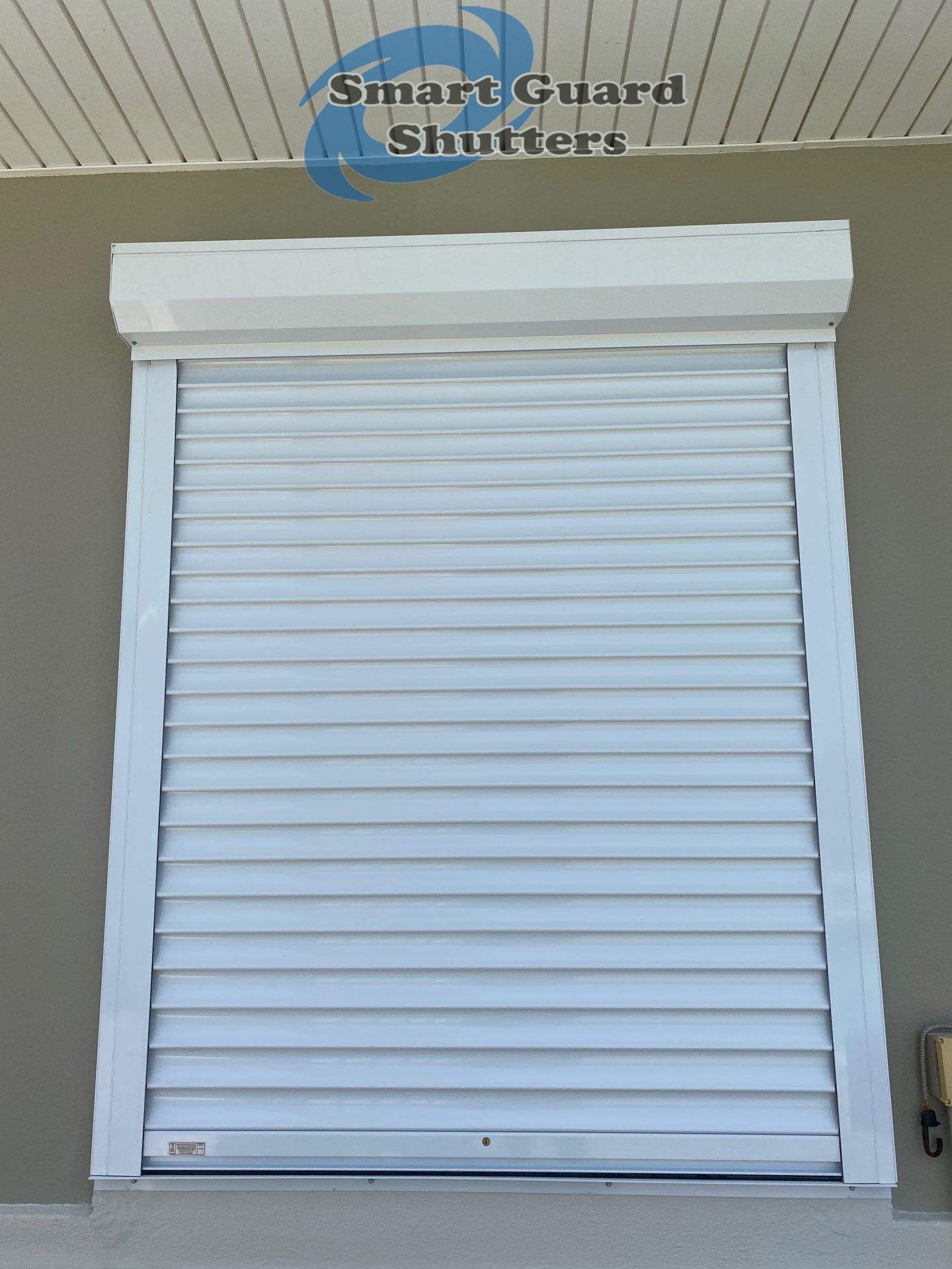 Rolling Shutters in White  by Smart Guard Shutters