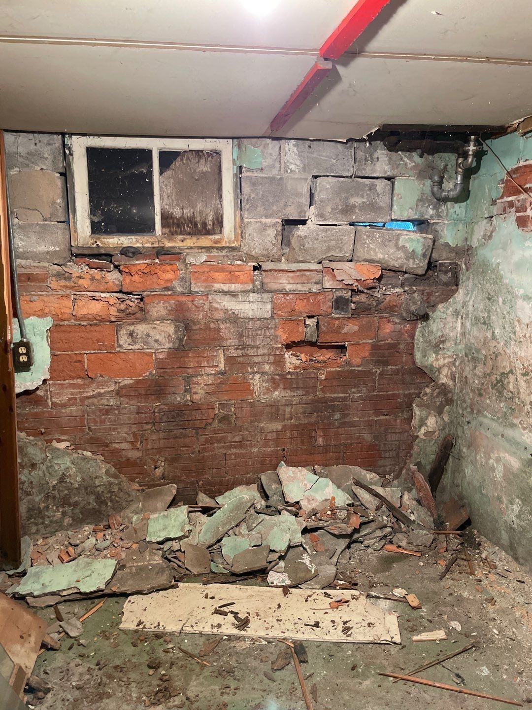Wall repair with Fortress Invisibeams by ACE Waterproofing & Basement Solutions