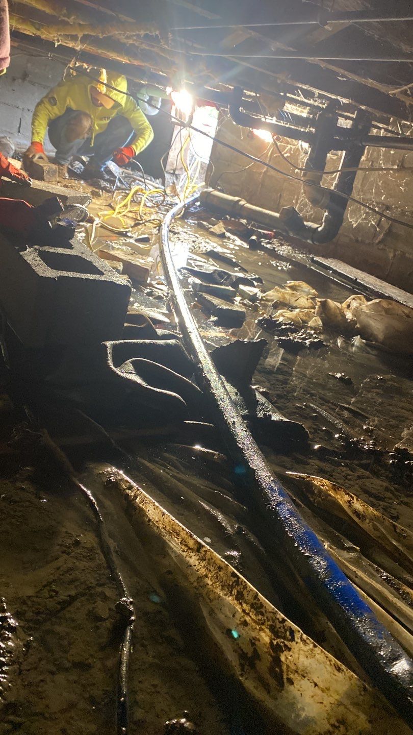 Crawl space encapsulation and Waterproofing using GrateDrain Waterproofing System by Toledo Basement Repair 