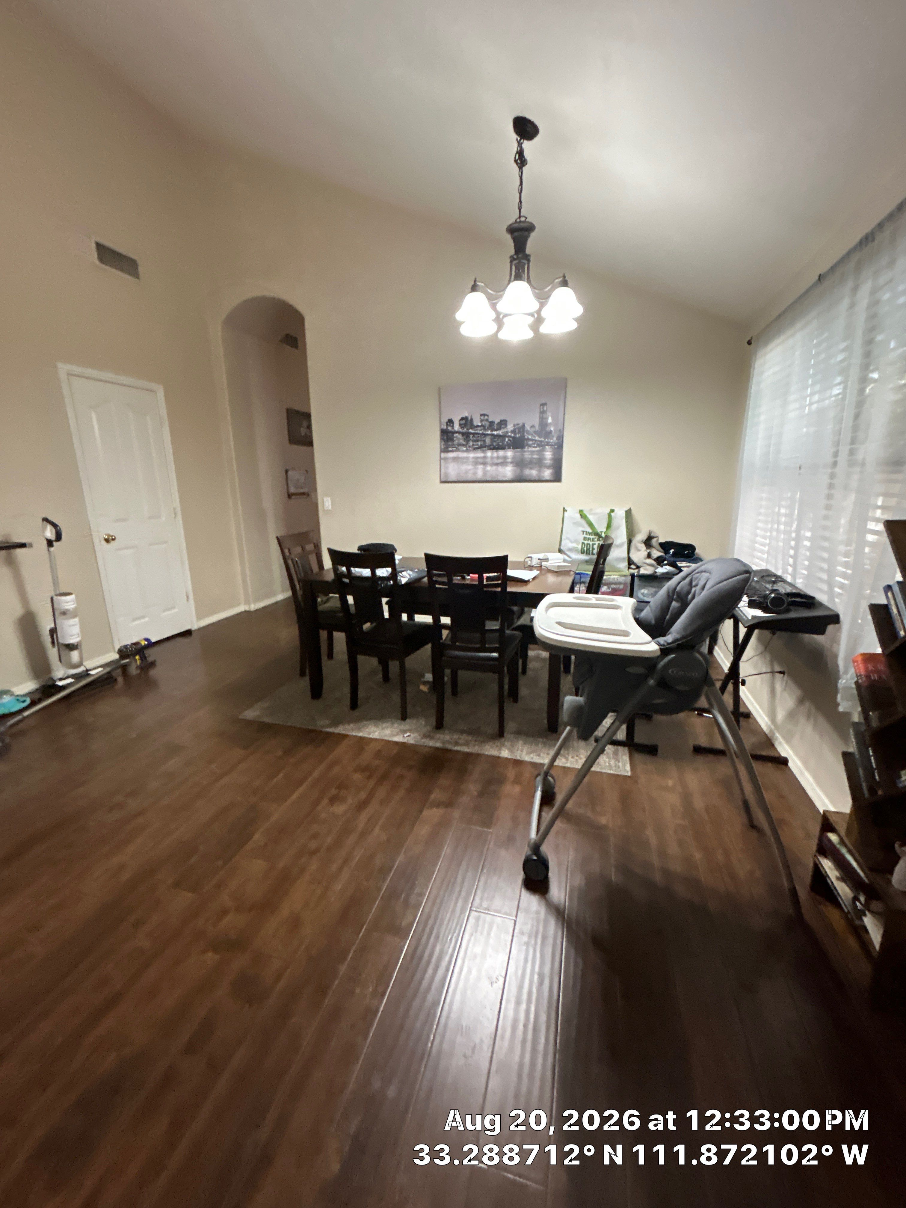 Dark Wood-Look Laminate Flooring Installation in Chandler by CompanyCam Sales Demo