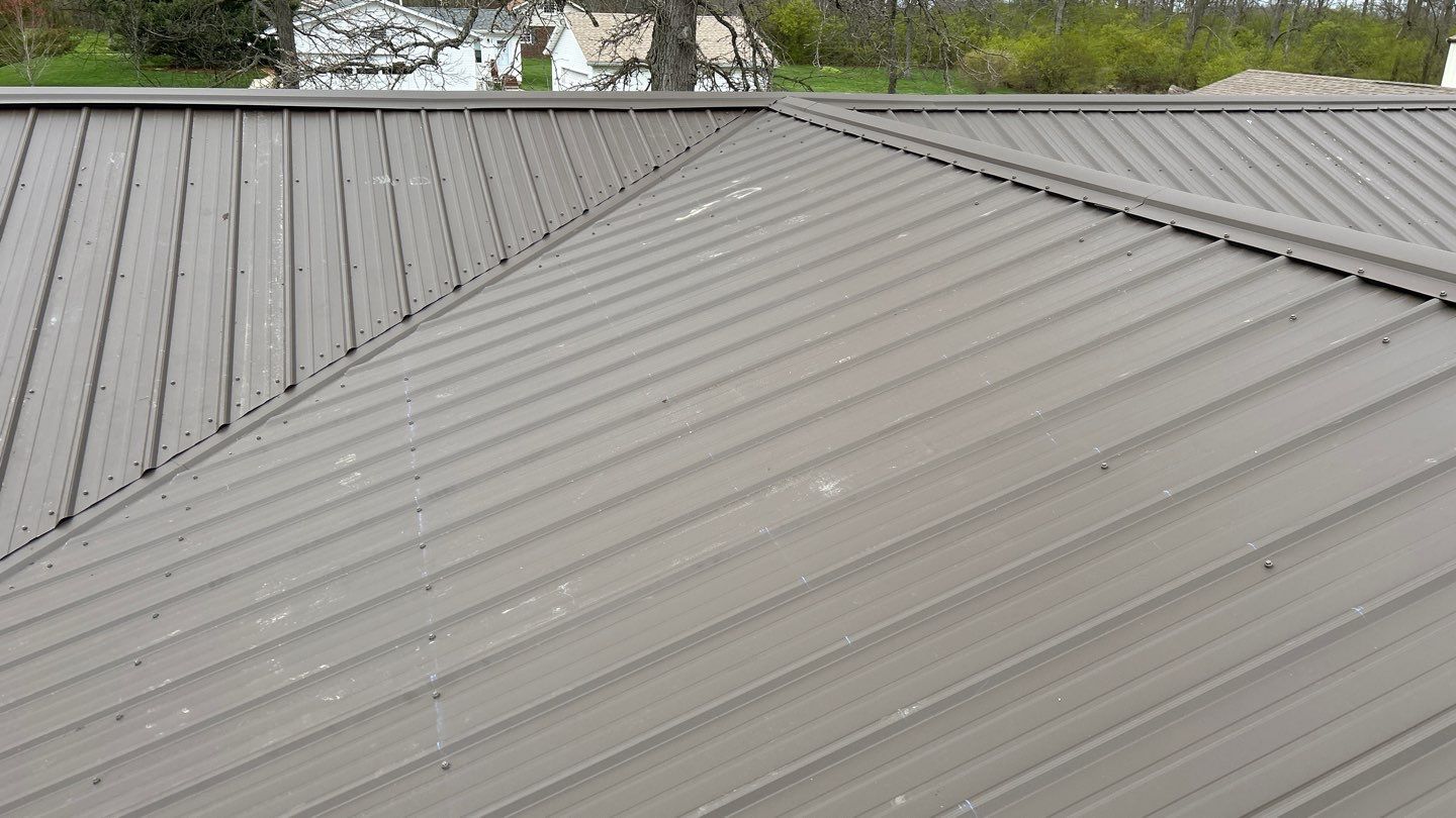 Residential Roofing Installation using Performance Panel Metal - Crinkle Bronze by RoofX 