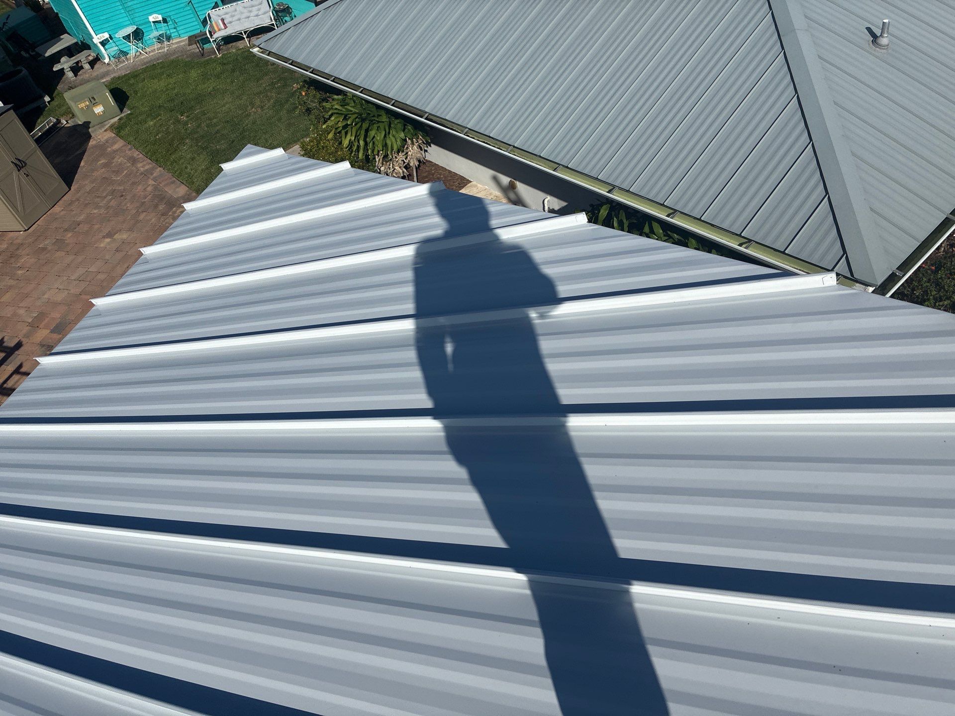 .032 Aluminum 1.5" Mechanical Seam Regal White  by Total Roofing System The Metal Roof Experts