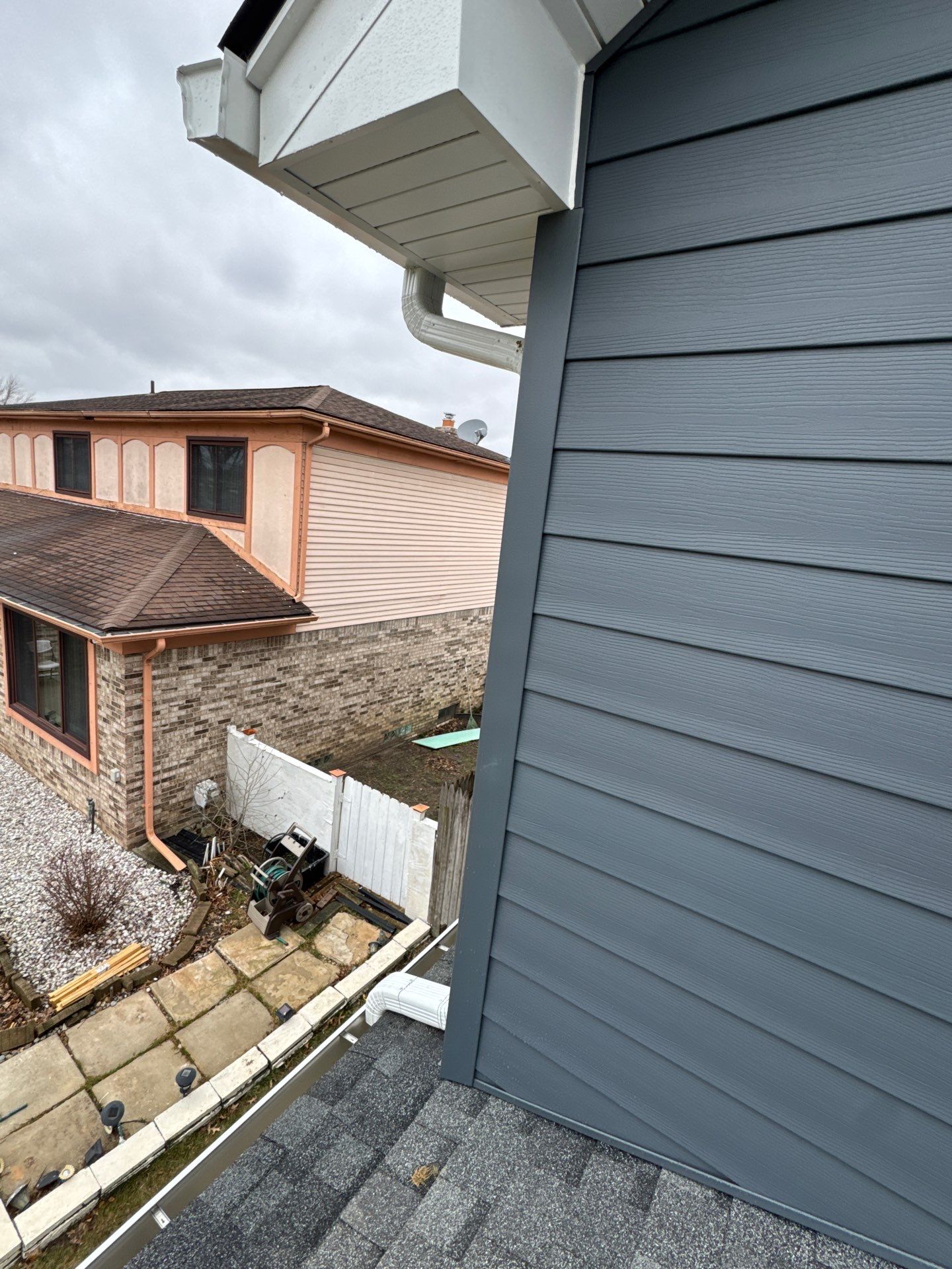 Siding Replacement using Alside Midnight Blue by 180 Contractors