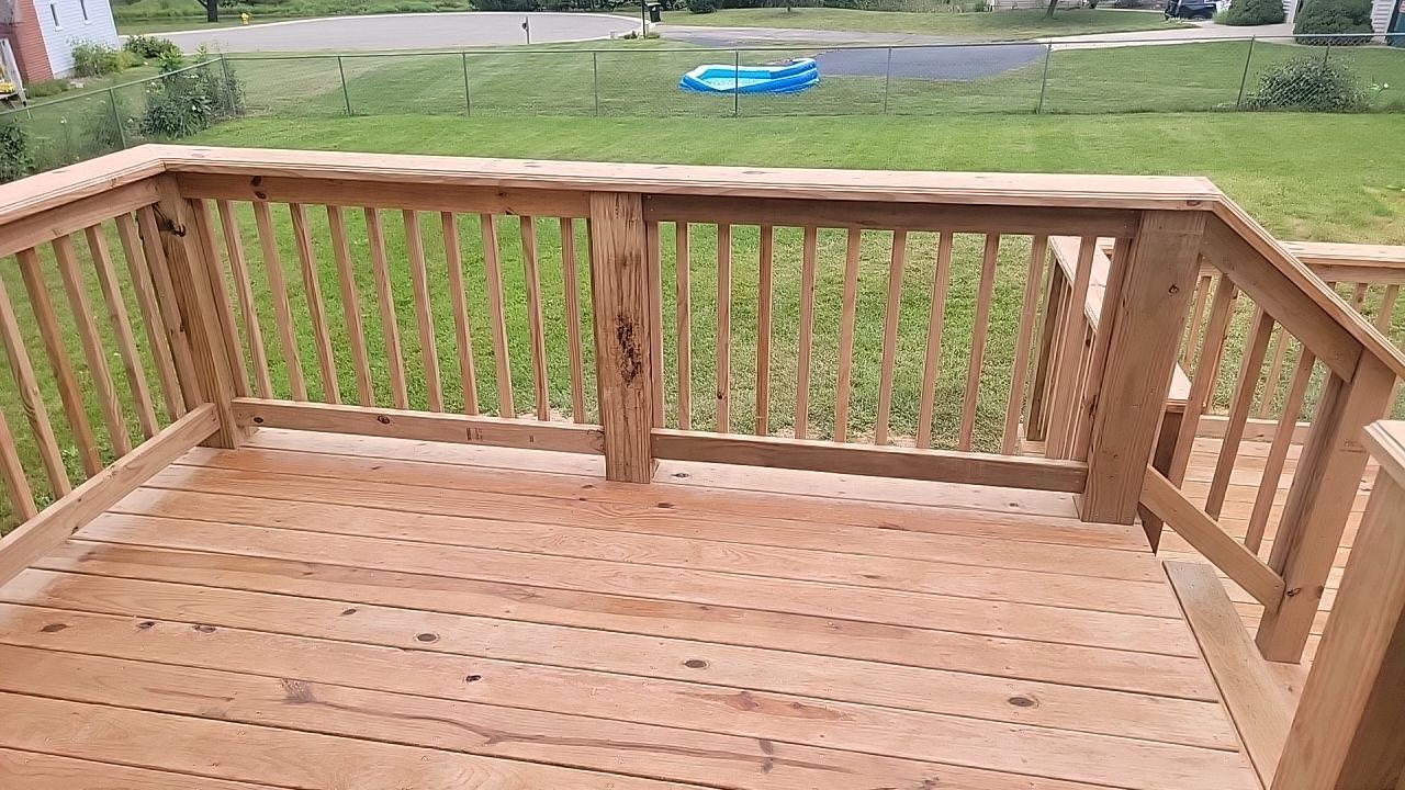 Deck Installation using Treated Lumber by Avalon Roofing and Exteriors