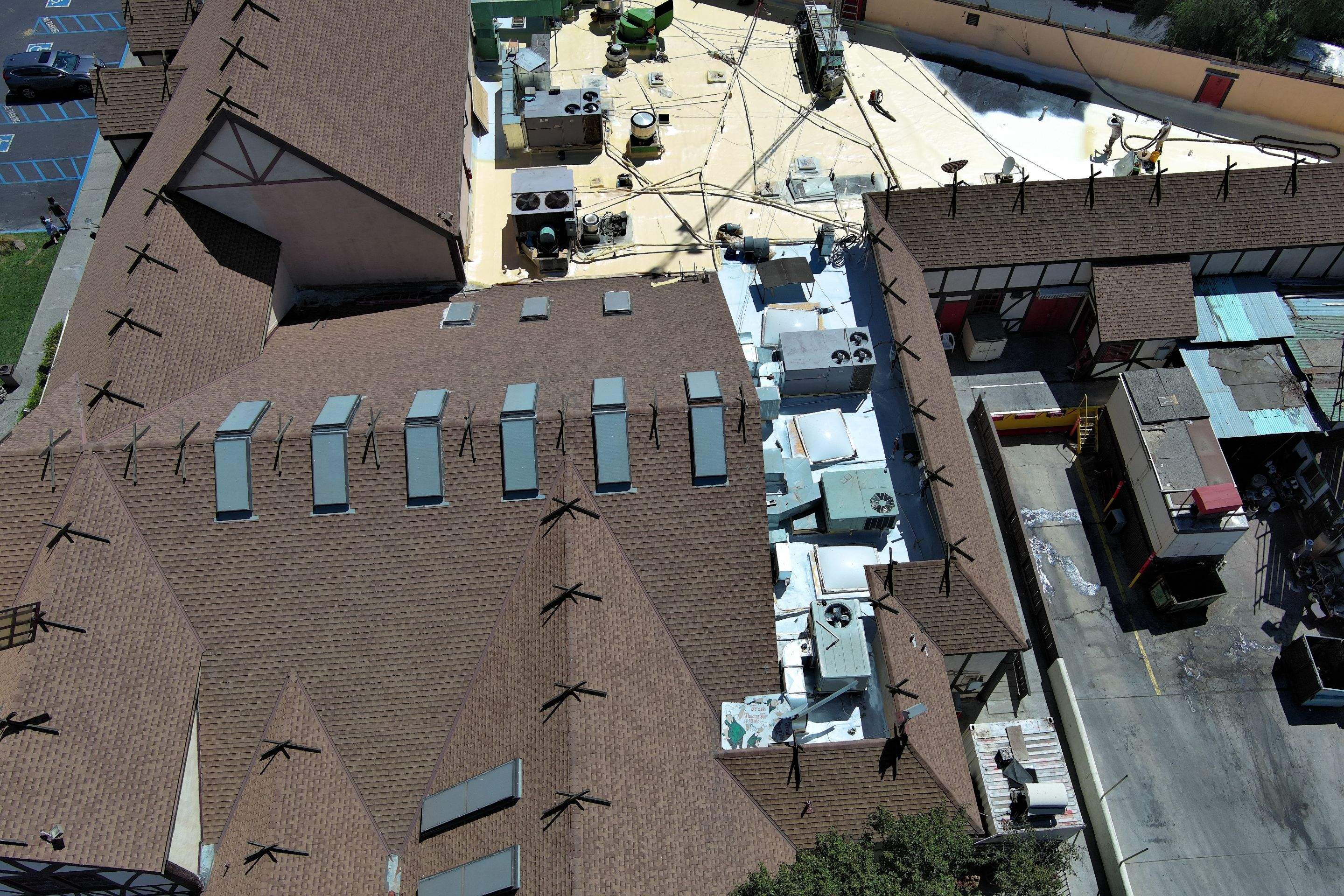 Spray foam and coatings using General Coatings acrylic coatings and spray foam by Straight Edge Roofing Inc