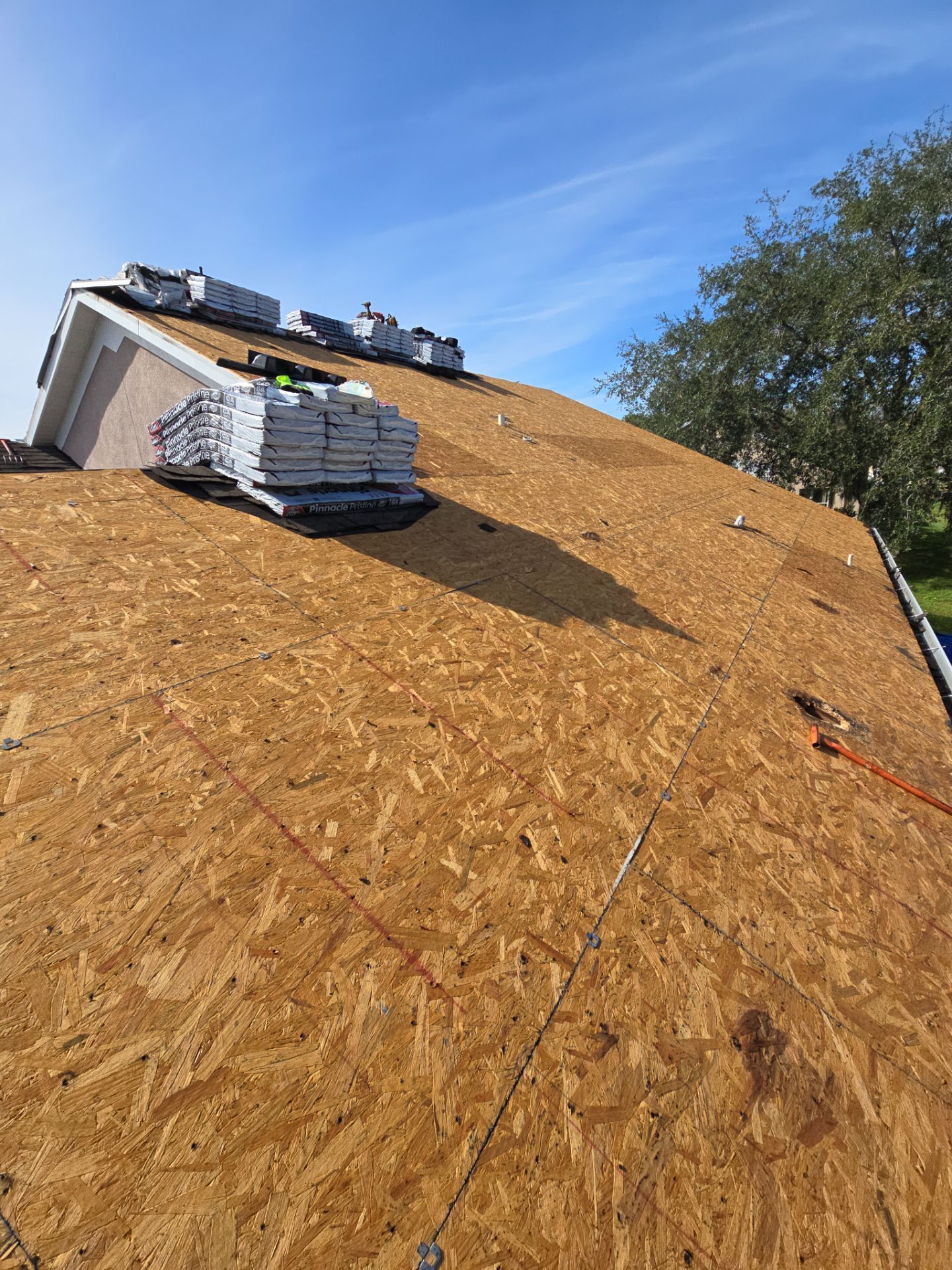 Atlas Pinnacle Pristine Architectural Shingle Roof Replacement in Kissimmee by Fortified Roofing Solutions Corp.