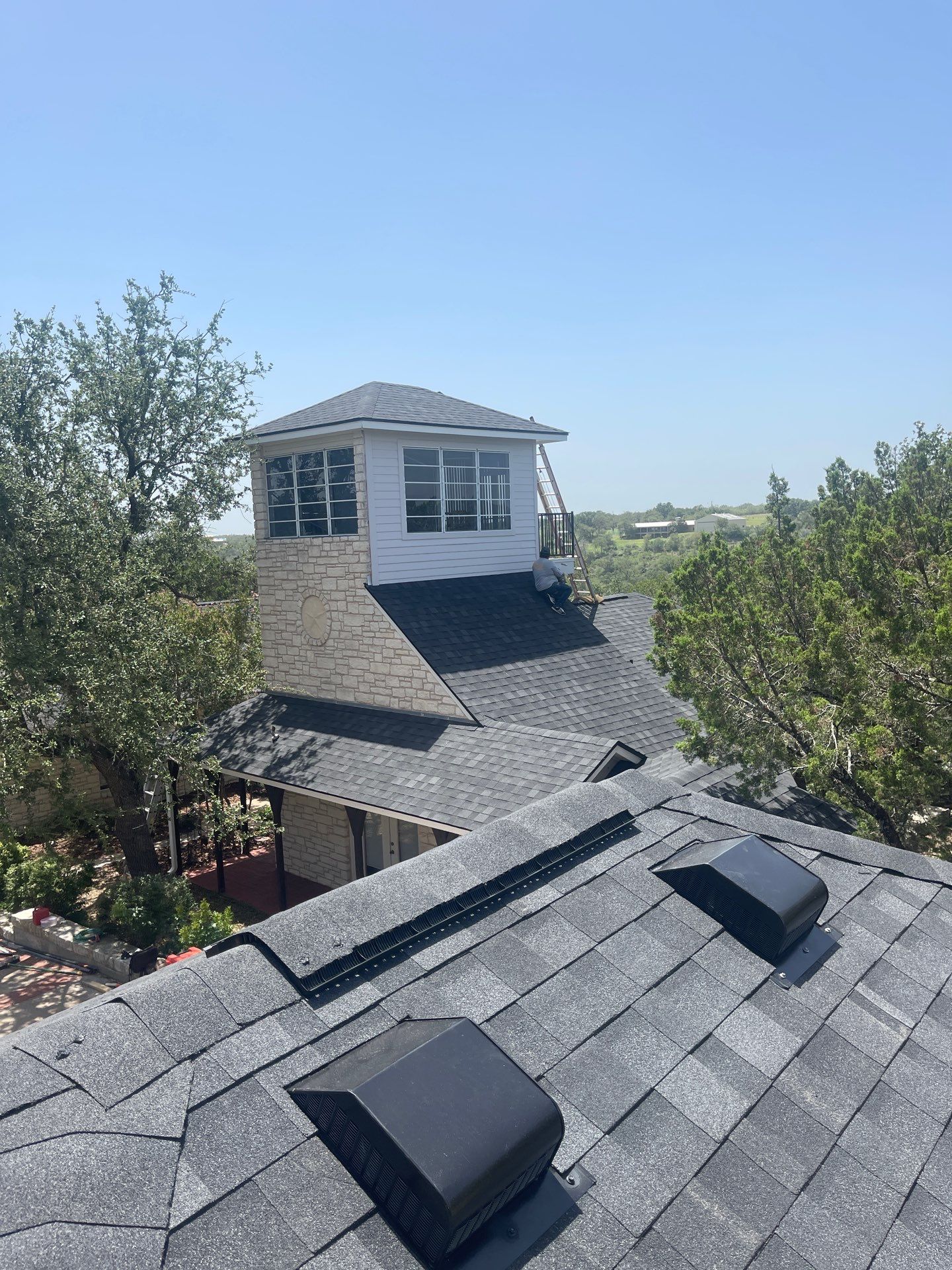 Residential Roofing Installation using IKO Nordic Granite Black by DeZign Roofing & Exteriors