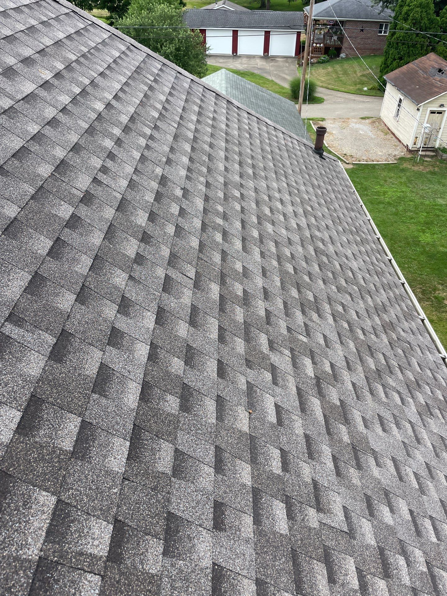 Residential Roofing Installation using GAF Timberline HDZ Charcoal by Rainstoppers Roofing