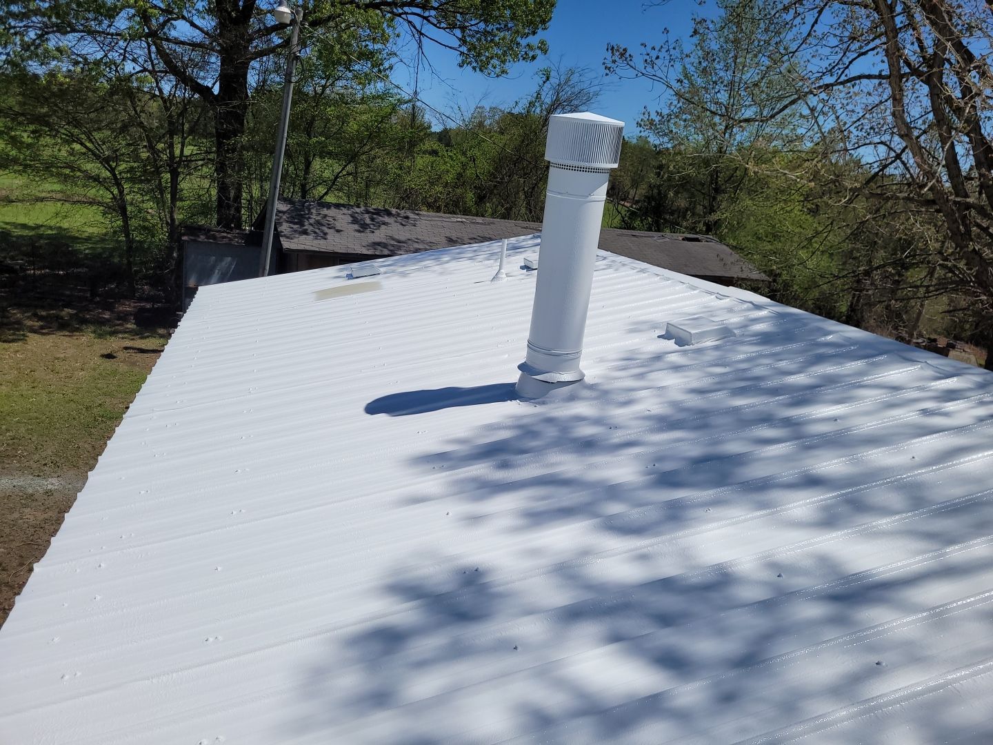 Commercial Roofing Installation using Aldocoat Coatings by Hostetler Roofing