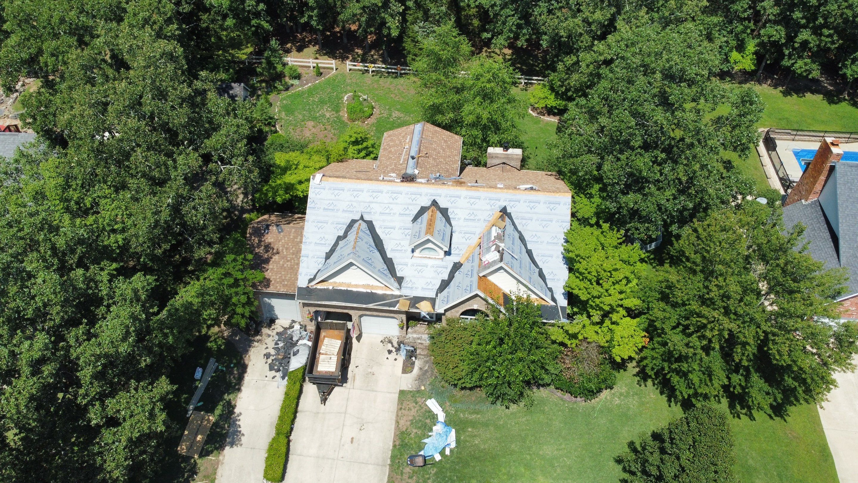 Residential Roof + Gutters & Downspouts & Gutter Guards  by Titan Commercial & Residential Roofing 