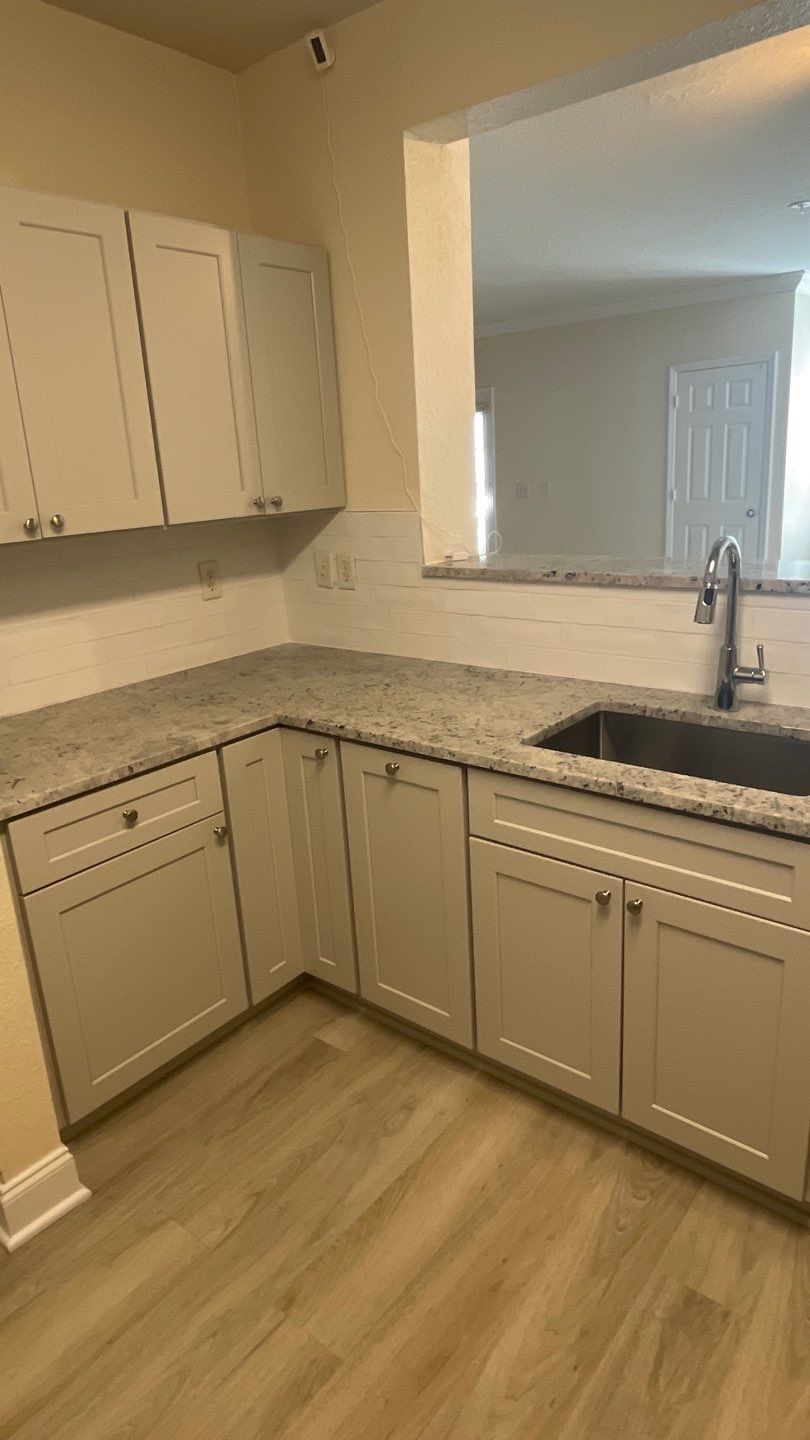 Home Remodel using LVP Flooring and Cabinets by HandyMangum
