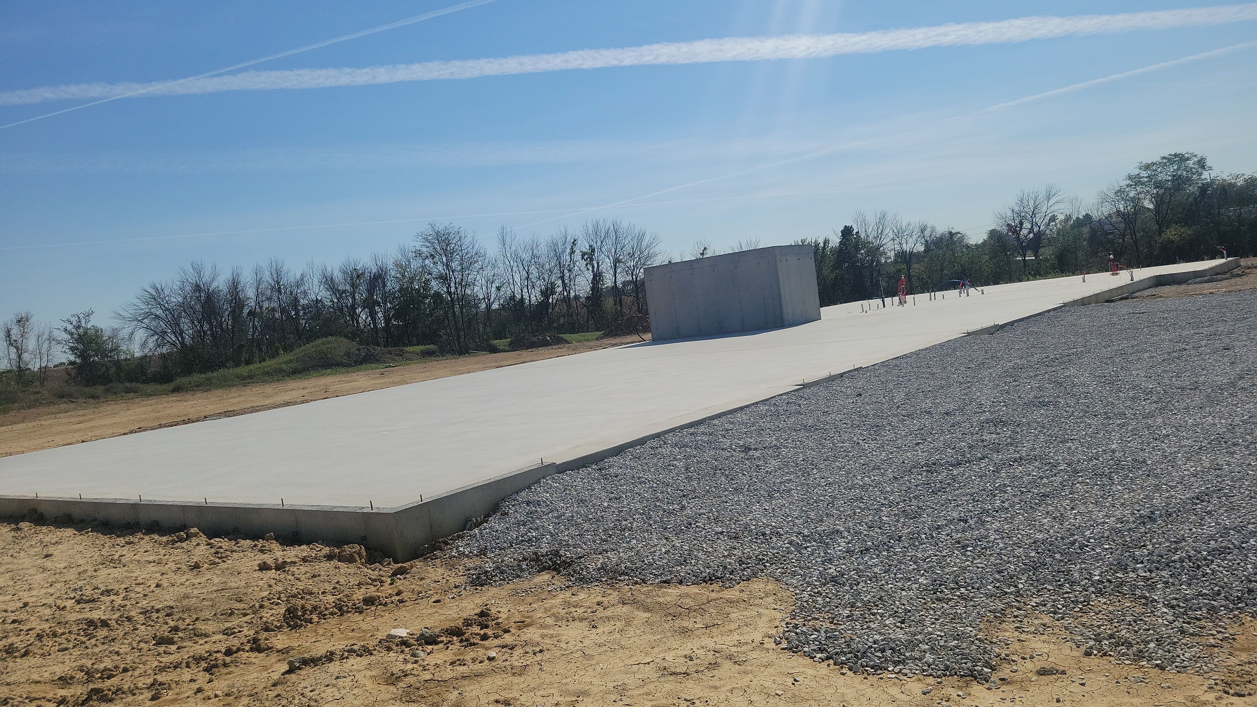 New Home construction w/ board and batten sides and metal roof  by Miles Construction 