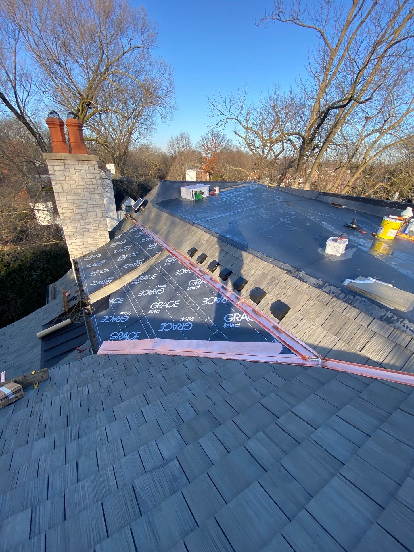 Brava Shake Tile Roof Installment with Copper Flashings by Custom Installations