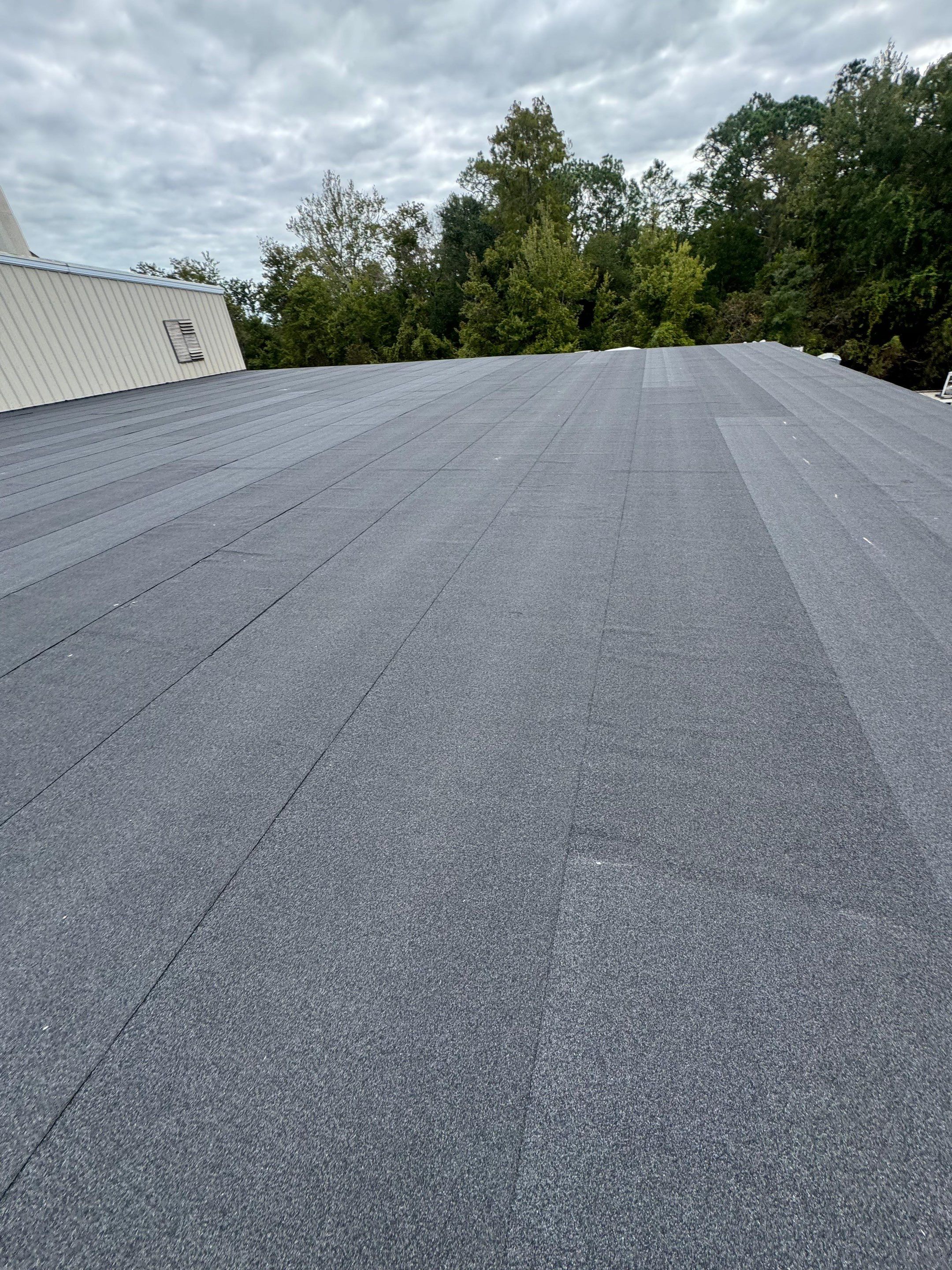 Flat Reroof Replacement Bunnell FL by Pinnacle Roofing Group