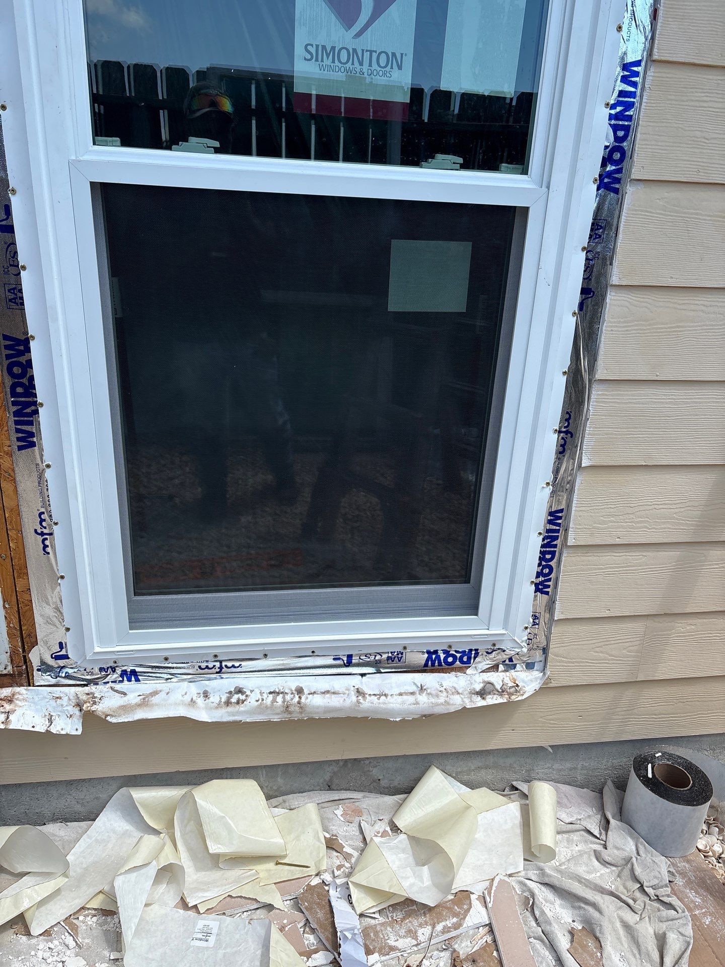 Curved Trim Windows by Bayfront Roofing and Construction