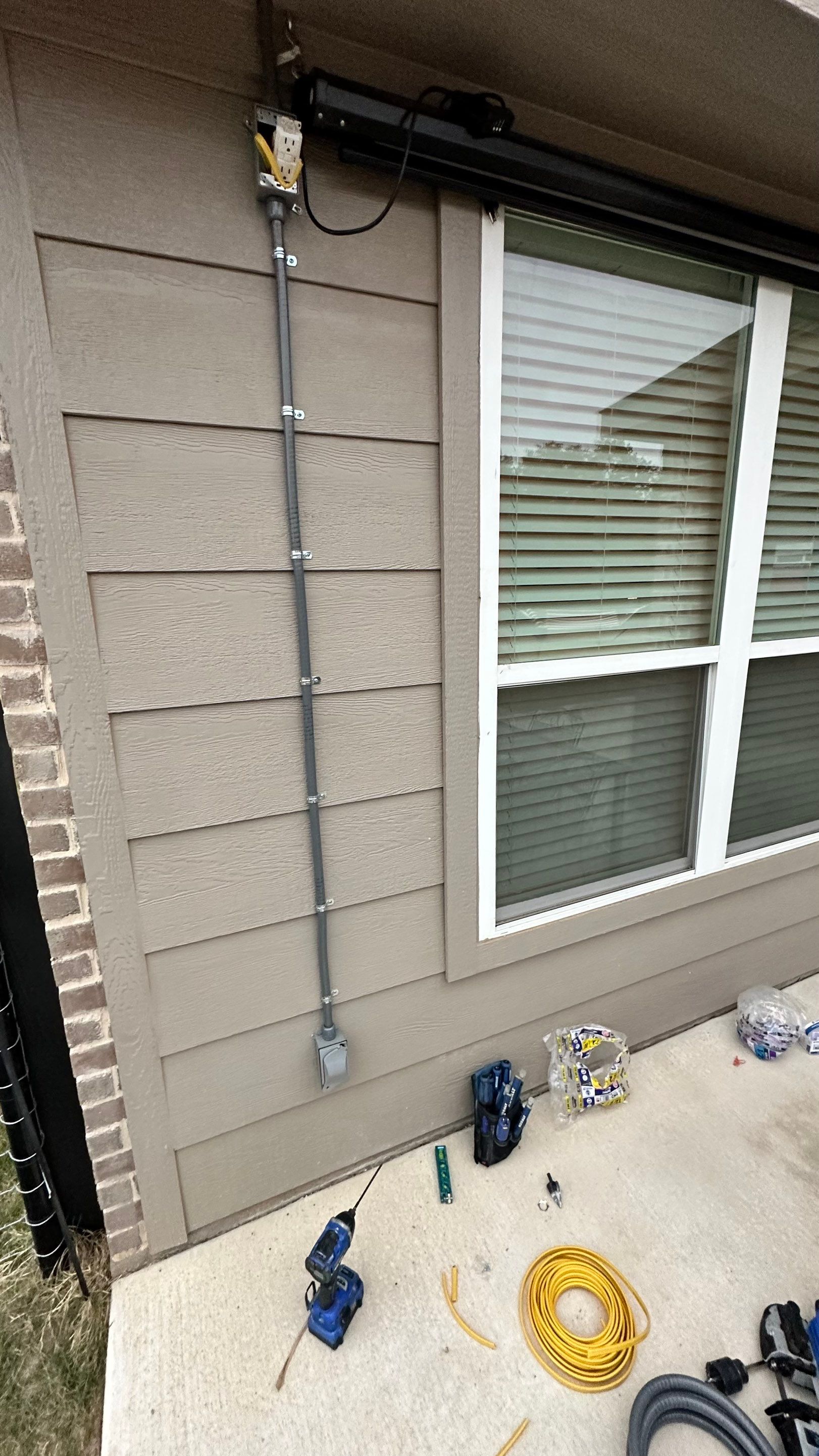 Tesla Wall Connector. Can lights. Spa disconnect. Exterior Outlets.  by Get Stoked Renovations