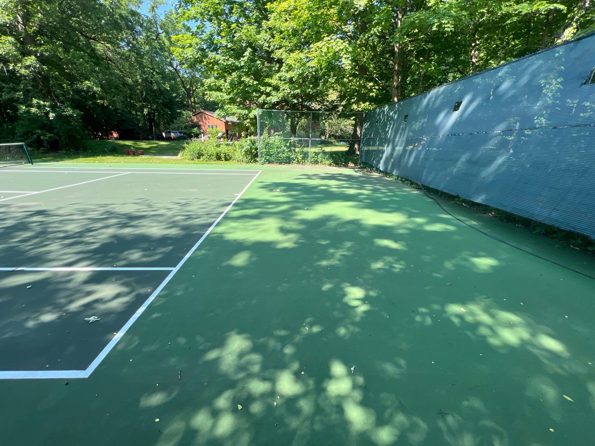 Deck, Patio, and Tennis Court Cleaning by Northern Power Washing LLC.