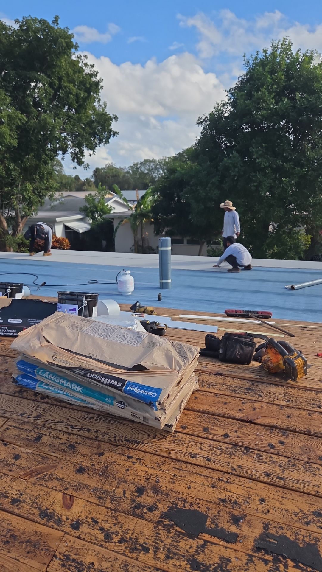 Silicone install-- Flat roof by Aastro Roofing