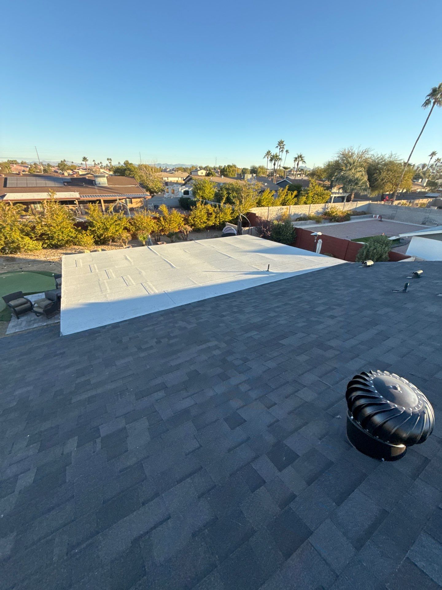Onyx Black Shingles by Reimagine Roofing