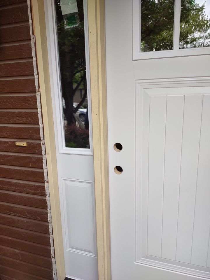 Siding Installation using Heartland Patio Door by EEC  Windows, Siding & Roofing 