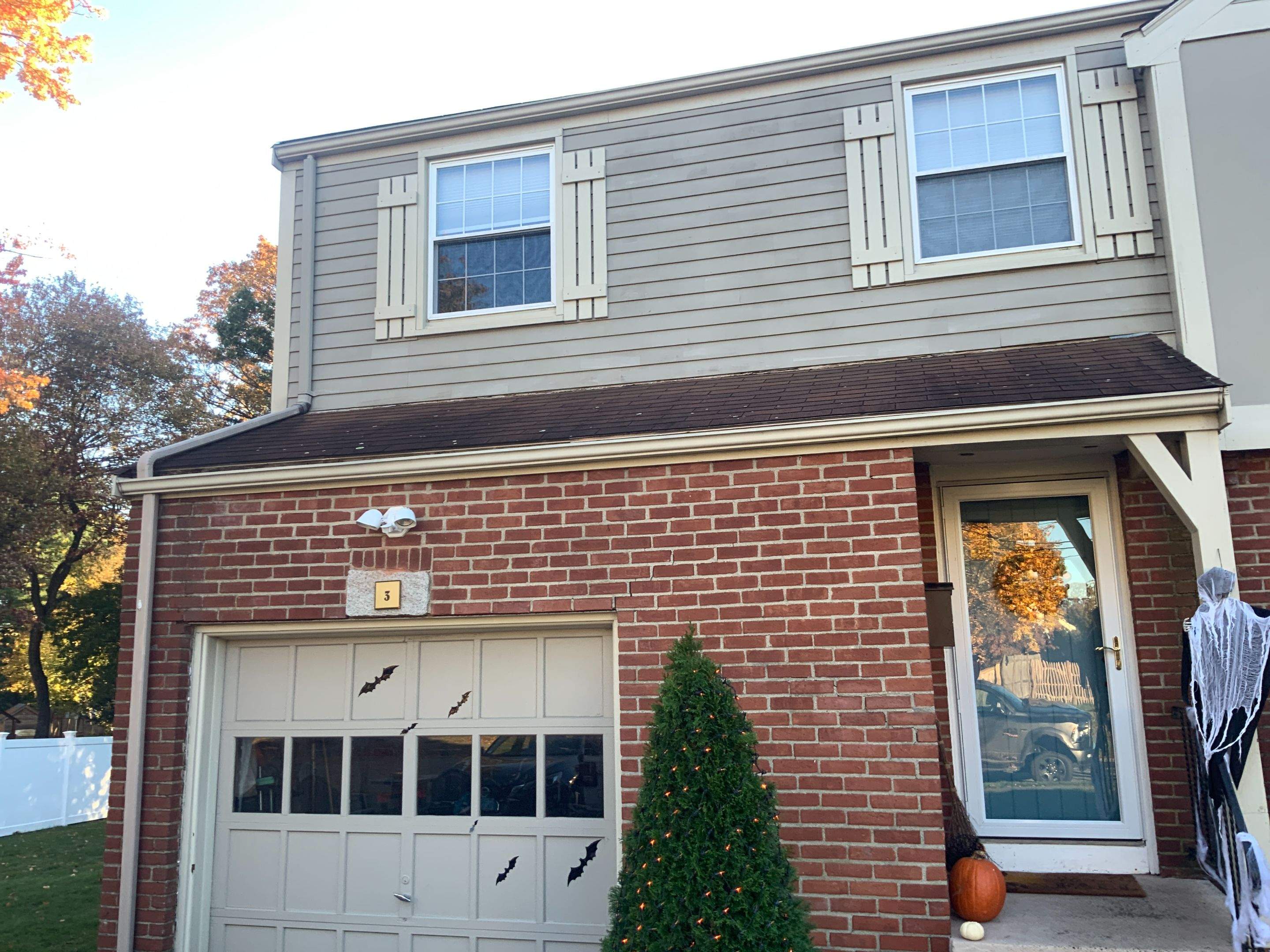 James Hardie siding, new metal roof and couple windows being installed. by UBrothers Construction