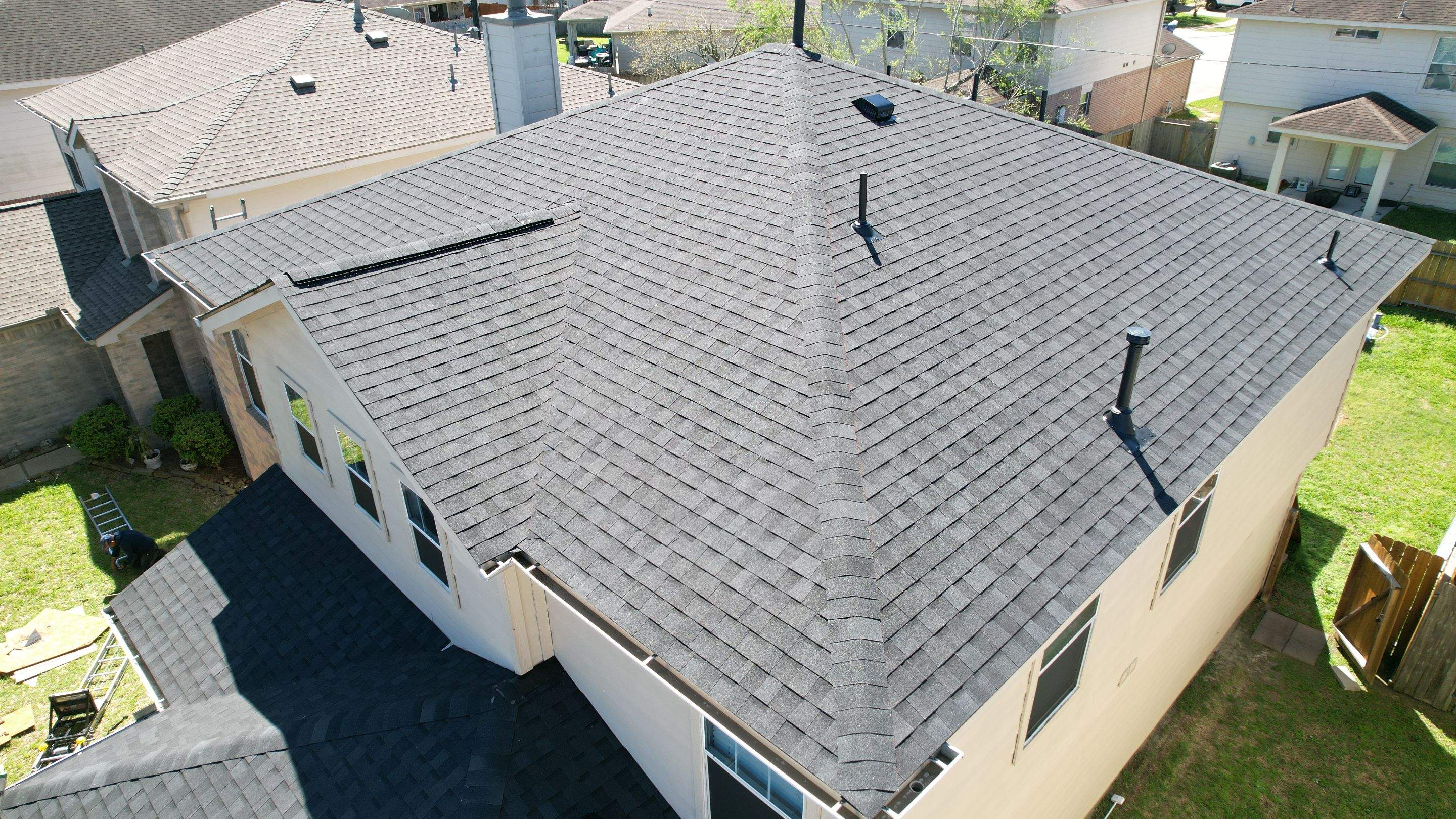 Complete Charcoal-Gray Roof Replacement — Spring, TX by PL Roofing & SB Roofing, LLC.