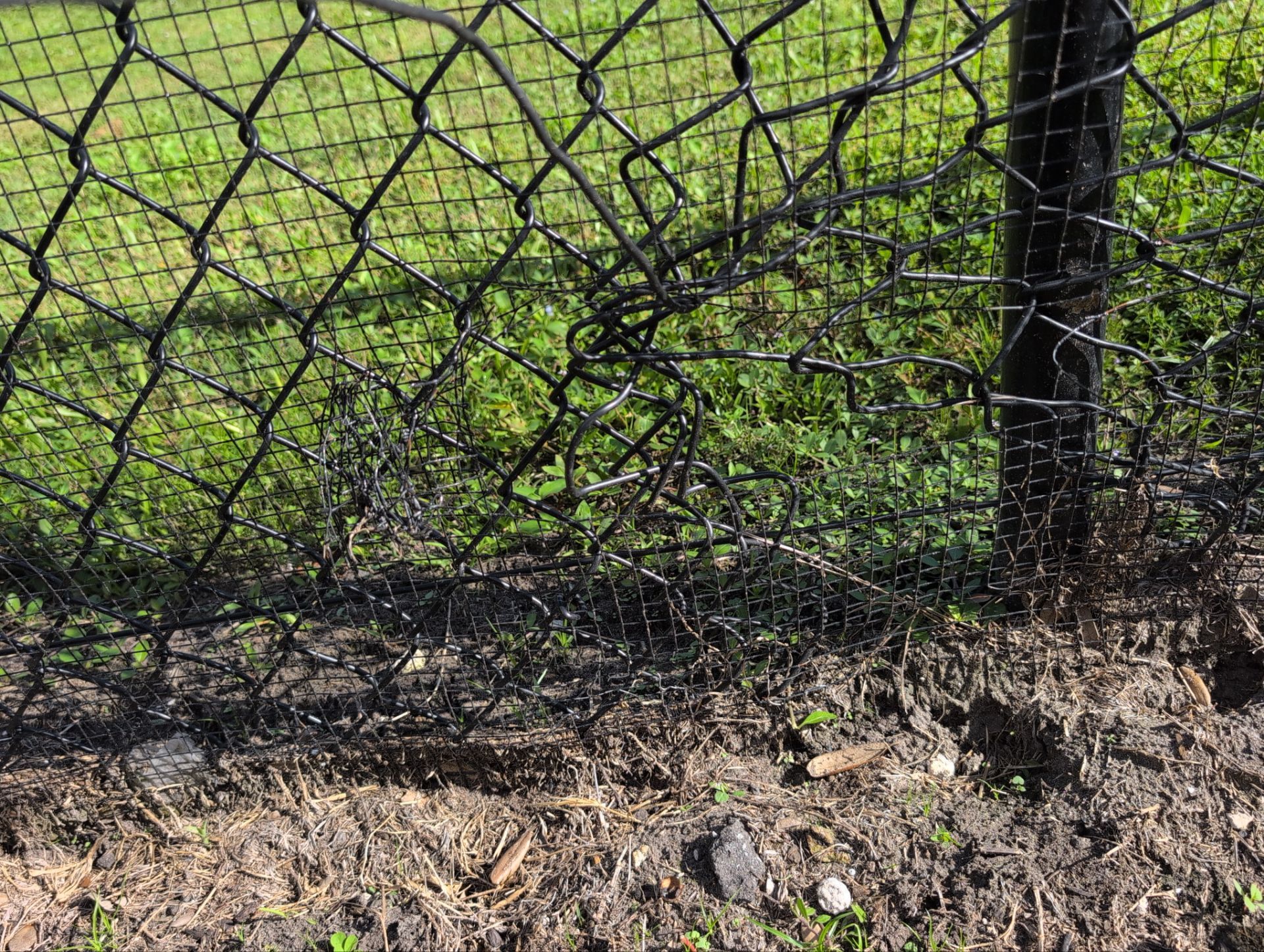 Chain-Link Fence Repair by
M.A.B. Landscaping & Property Maintenance