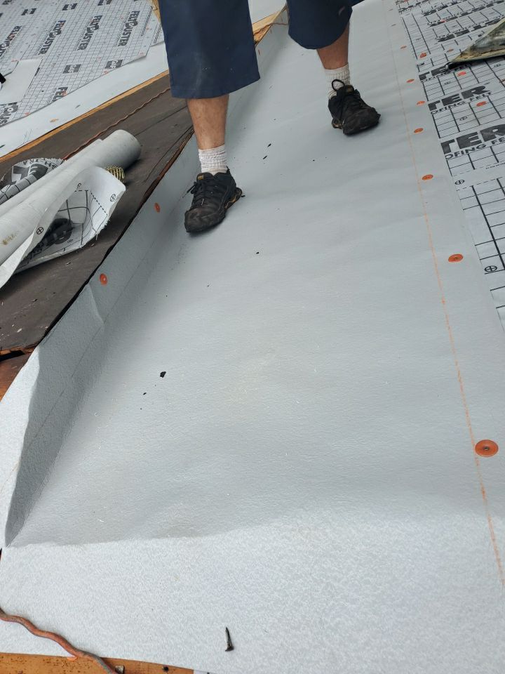 Residential Roofing Installation using Roof Replacement by American Roofing & Construction LLC
