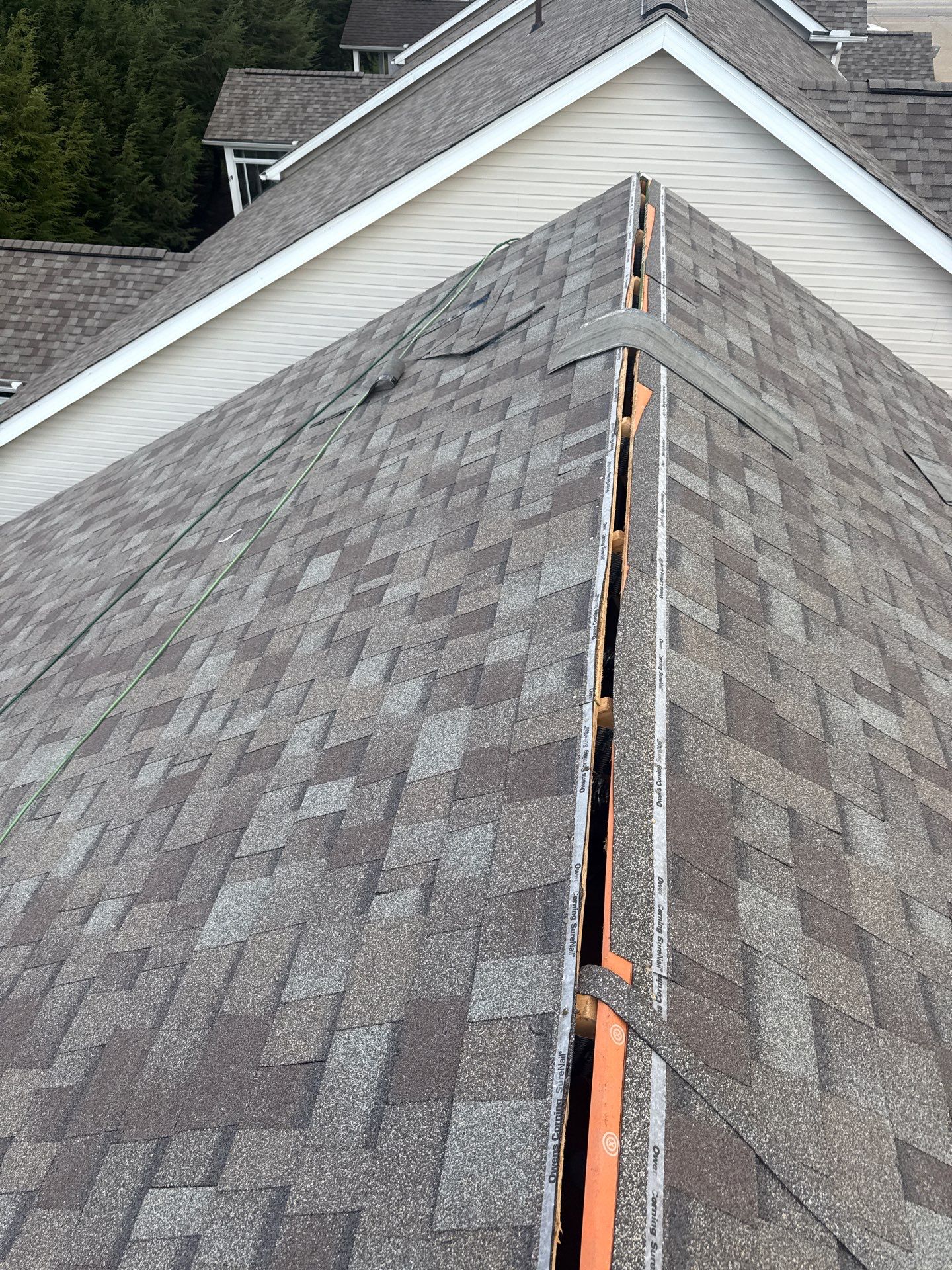 Residential Roofing Installation using Driftwood by Rainstoppers Roofing