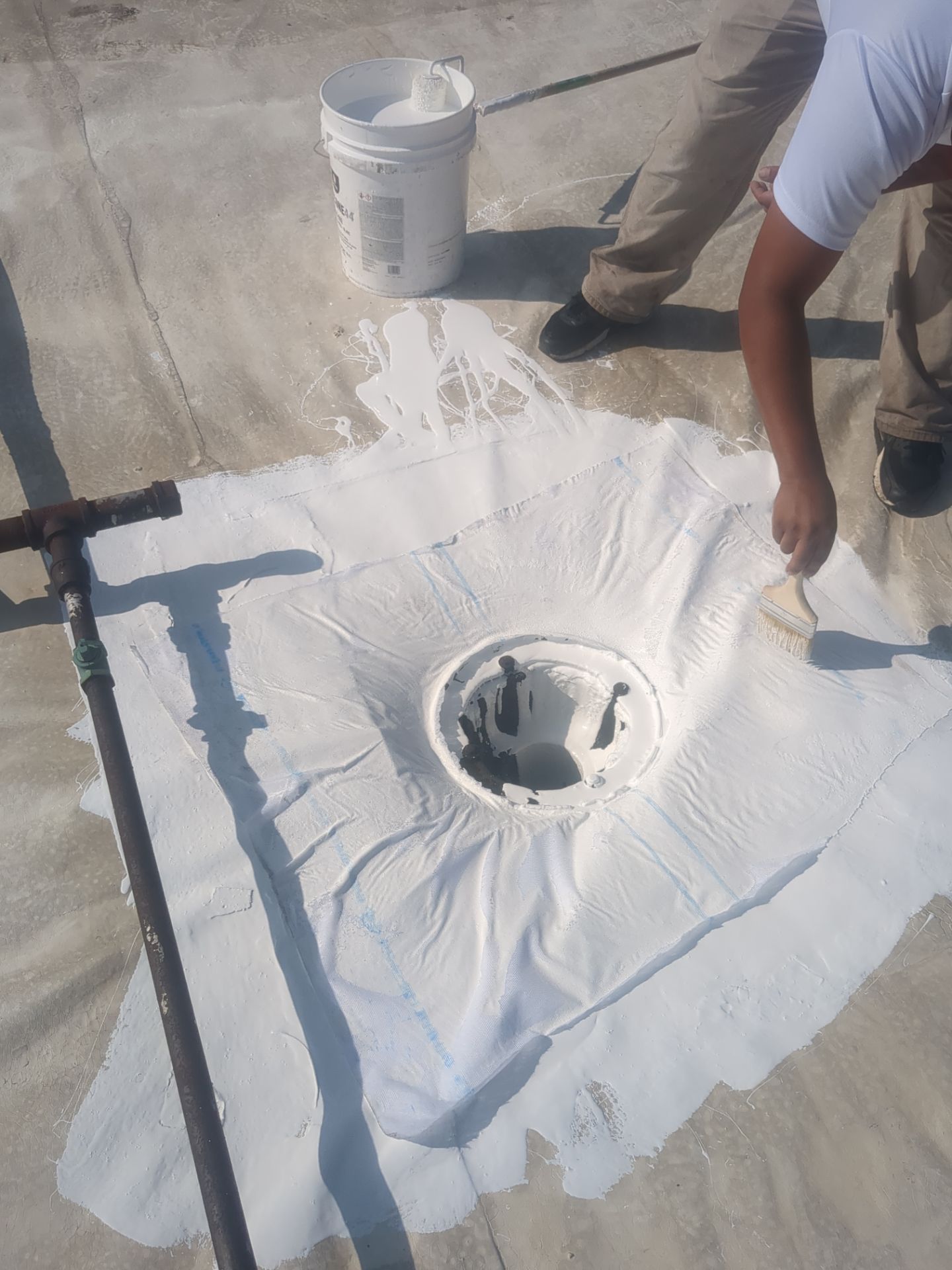Commercial Roofing Repair using UniFlex Silicone Roof Coating by 3 Daughters Construction 