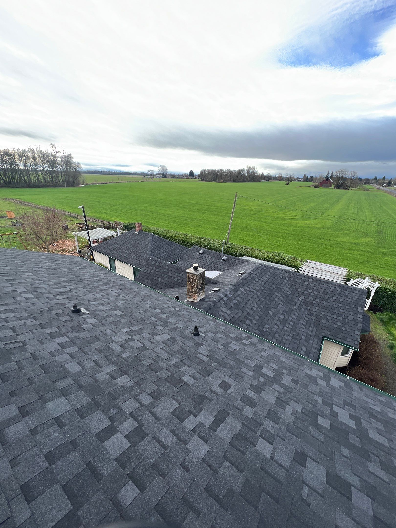 Residential Roofing Installation using IKO Dynasty (Color: Granite Black) by Orezona Building & Roofing Company, Inc.
