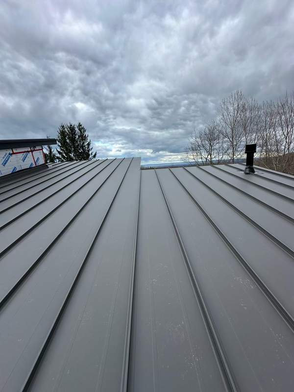 Residential Roofing Installation using 24 Ga Standing Seam Metal by Jay Carter Roofing & Sheet Metal