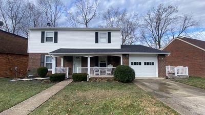 Replace dated vinyl siding with new white exterior Portfolio vinyl siding
