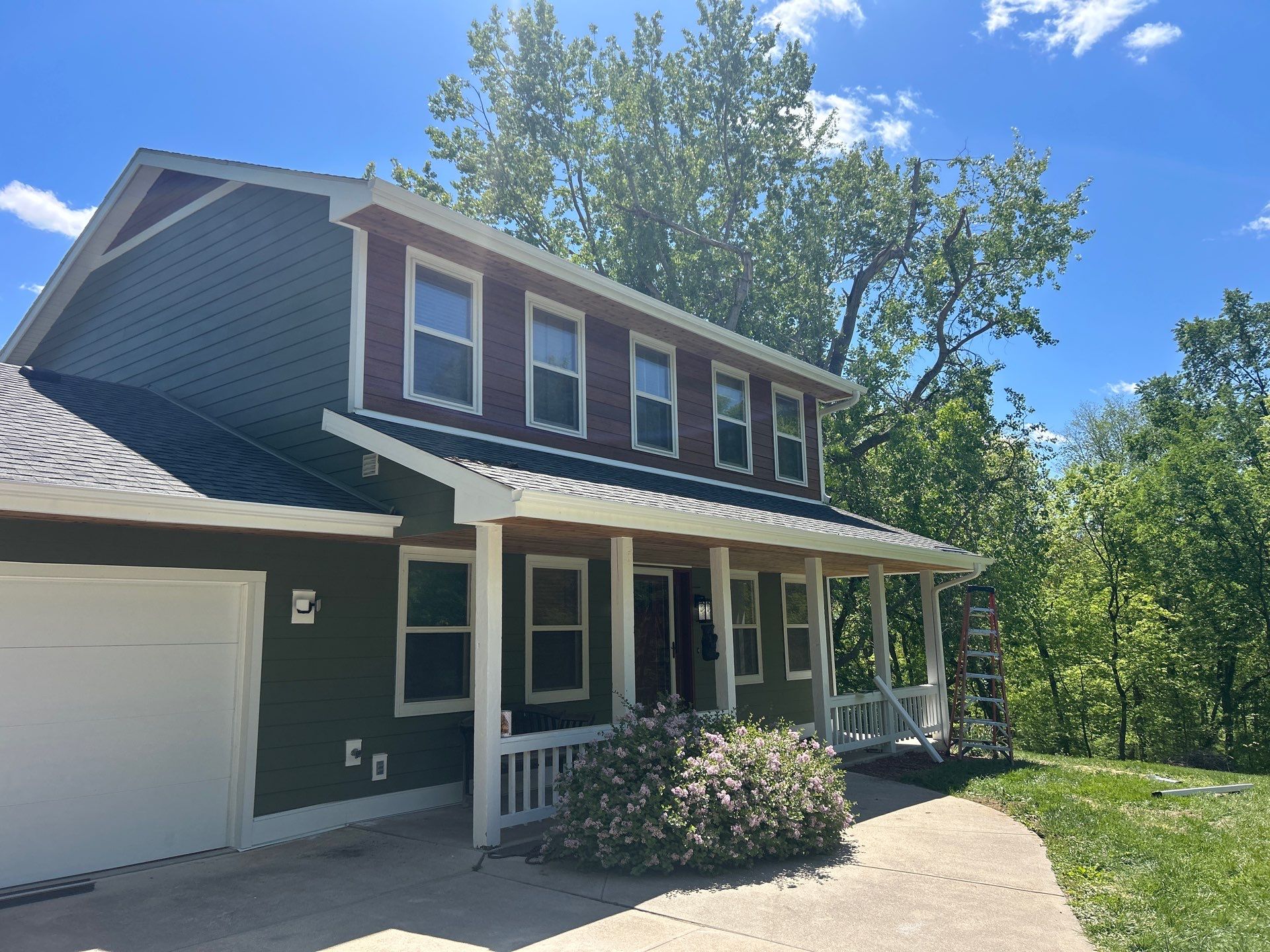 James Hardie Siding Replacement and Gutter Installation in Fort Calhoun by Carps Complete Exteriors 