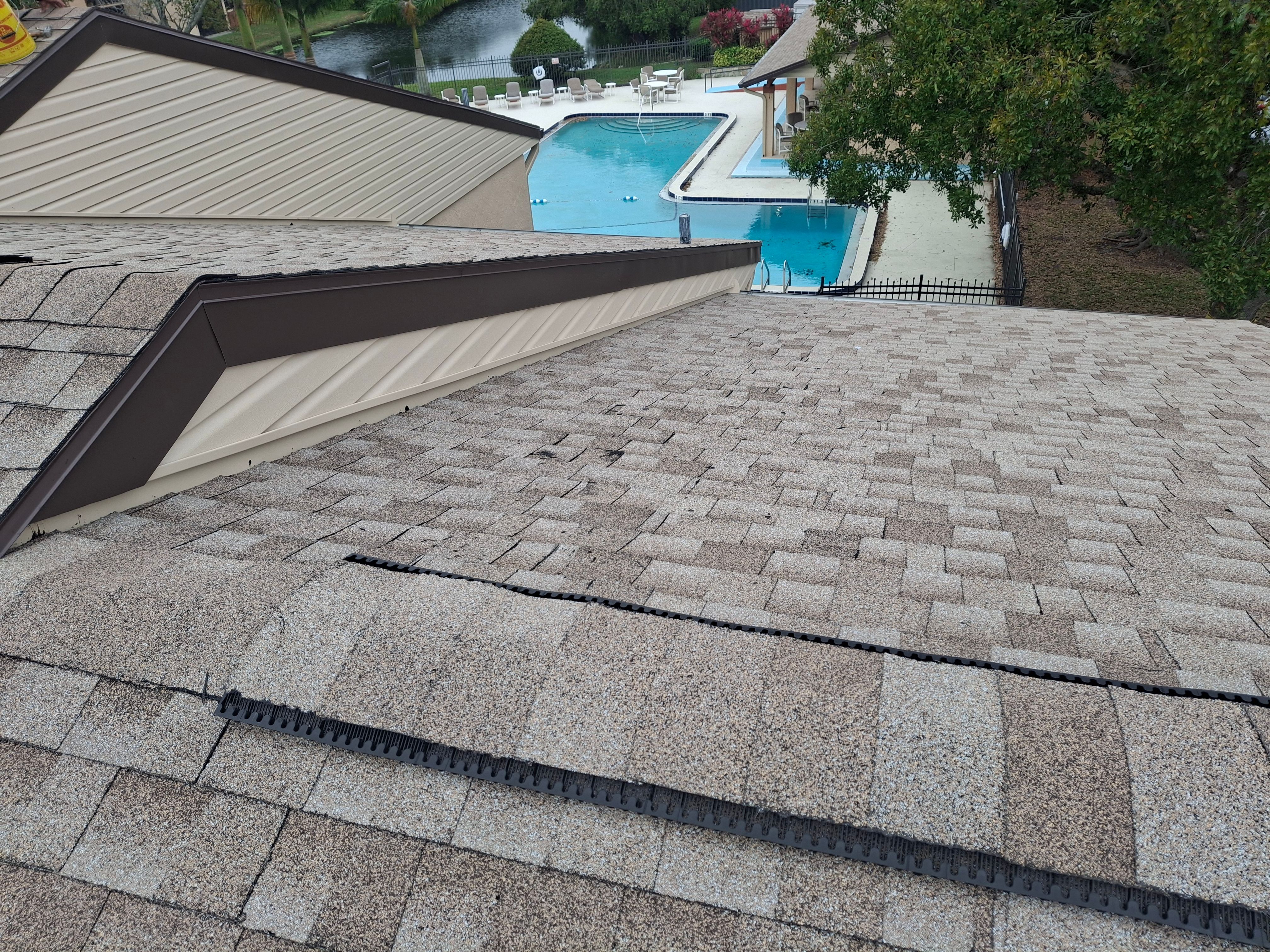 Multi-Family Roof Replacement and Siding Installation in Melbourne by Florida Roofing and Renovations Inc.