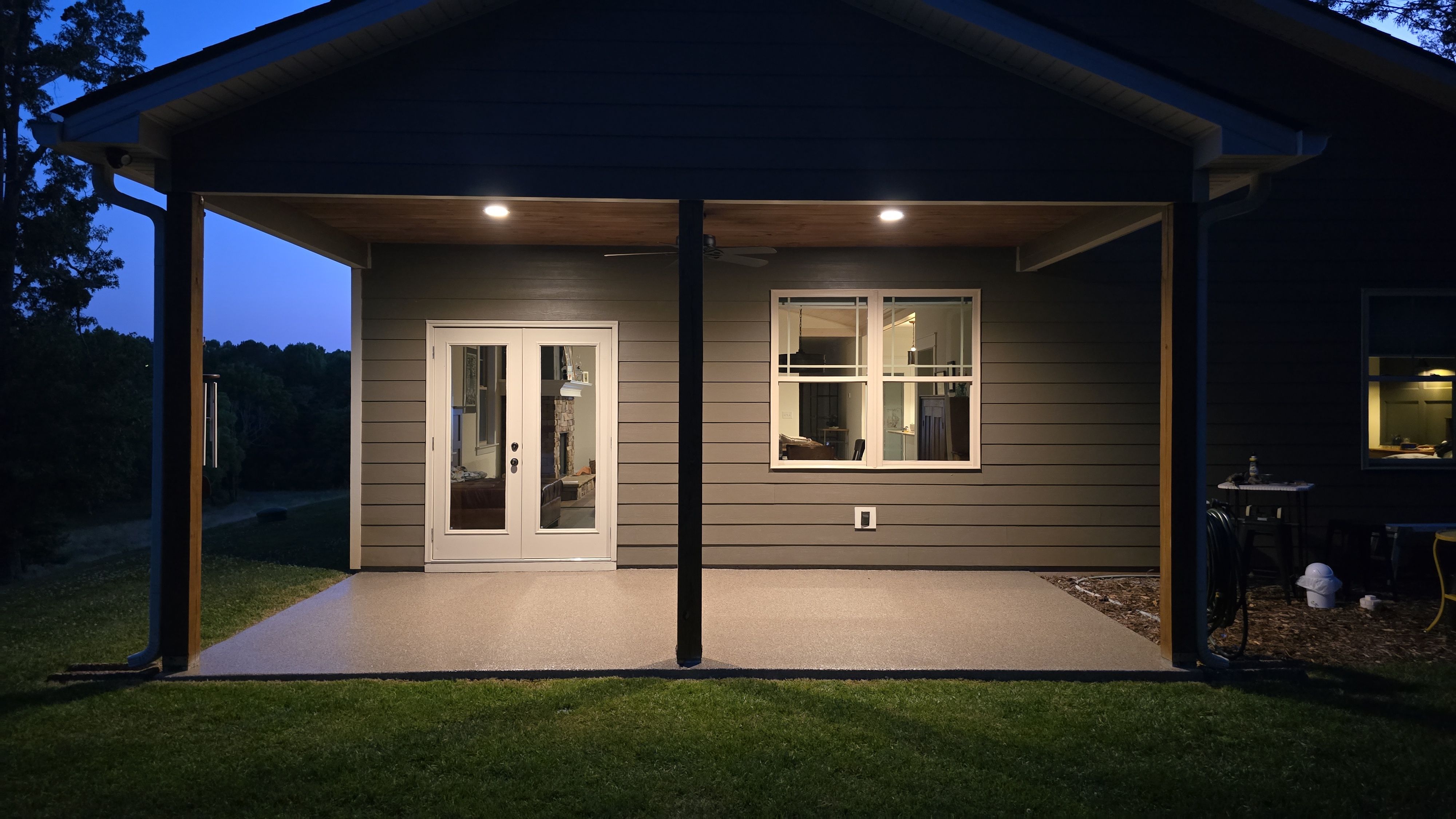 Garage, Back Porch, and Patio using Obsidian by Elite Floor Solutions