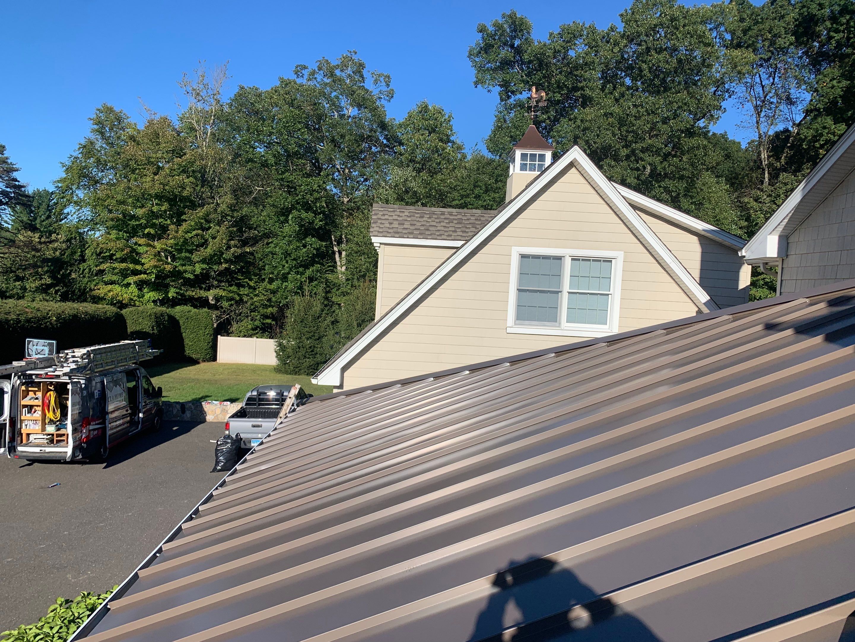 Asphalt & Standing Seam Metal Roof Replacement  by Lecla Home Improvements and Roofing INC