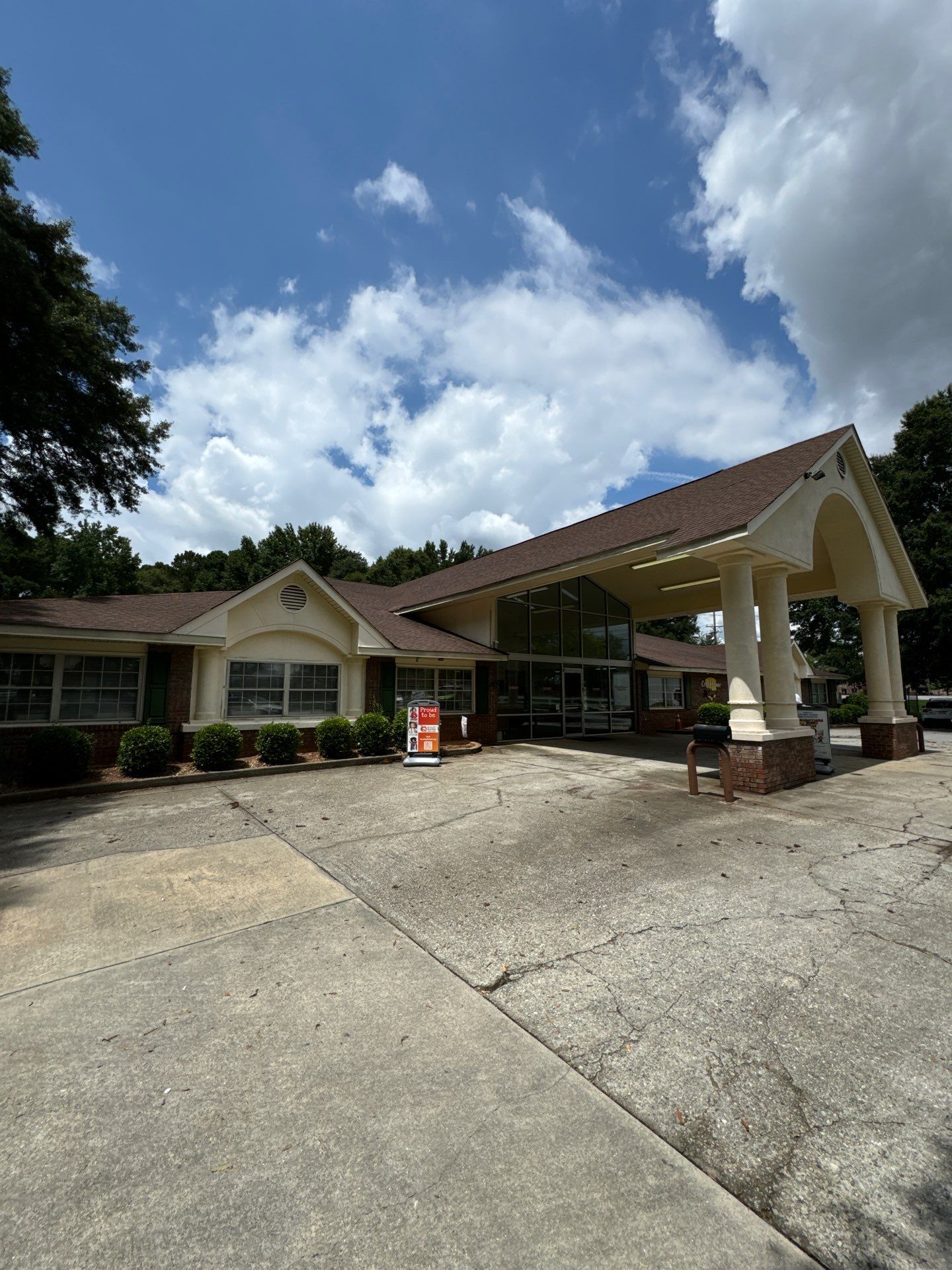 Commercial Exterior Brick and Stucco Painting in Fayetteville by Swift Home Renovations