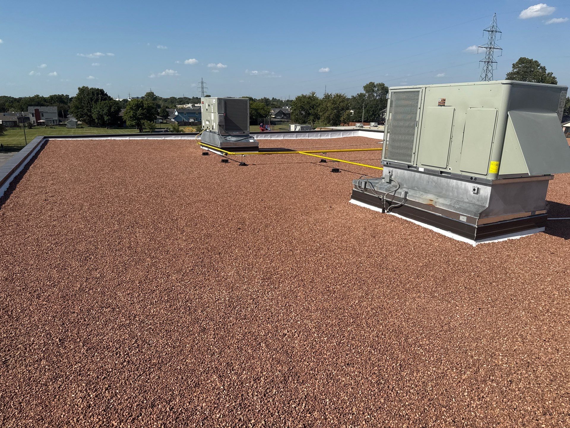 Mills Elementary School Commercial Re-Roof and Moisture Protection by Secondary Rhodes