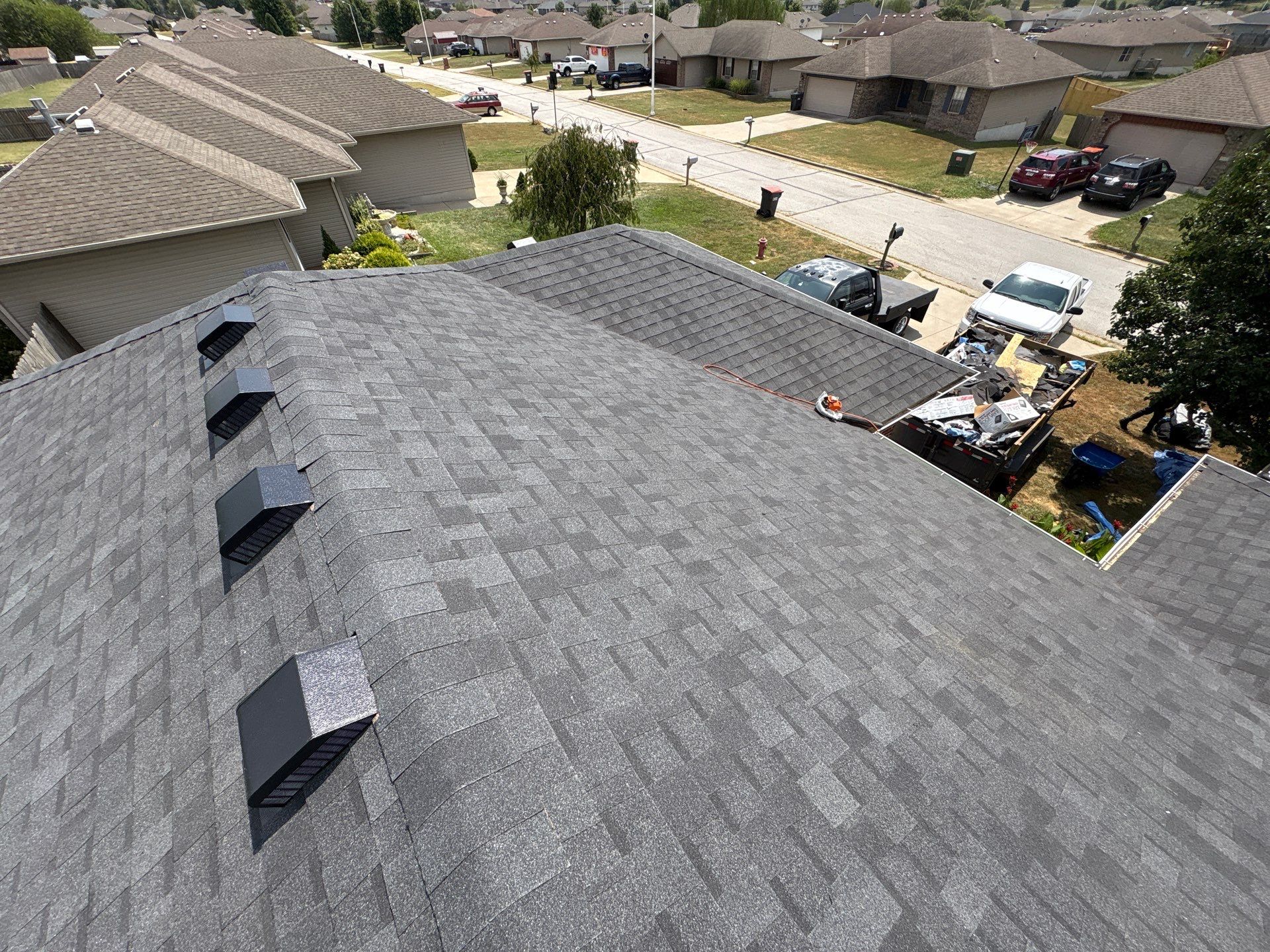 Residential Roofing + Gutters & Downspouts Install  by Titan Commercial & Residential Roofing 