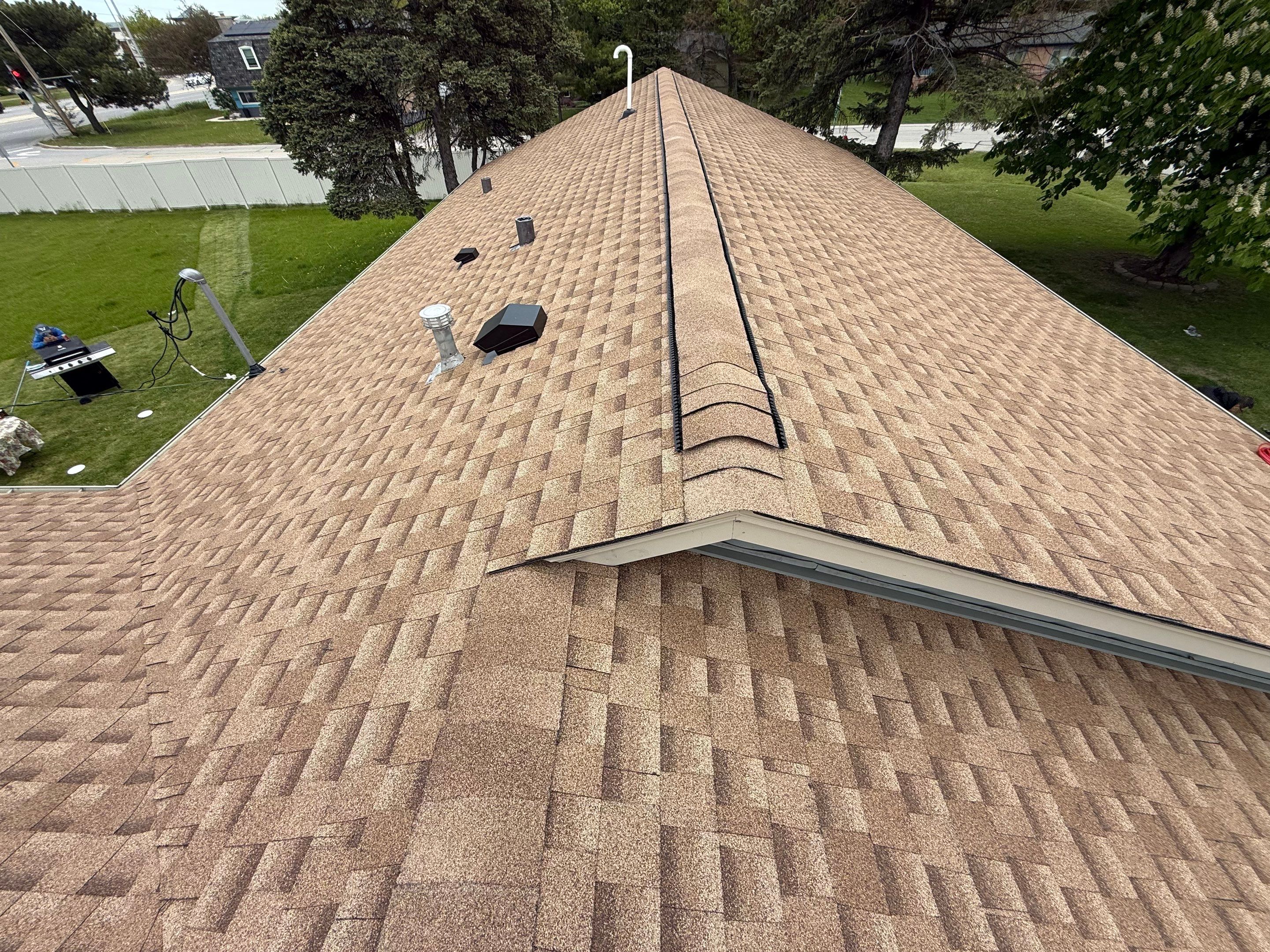 Roof replacement by Optimal Home Improvement 
