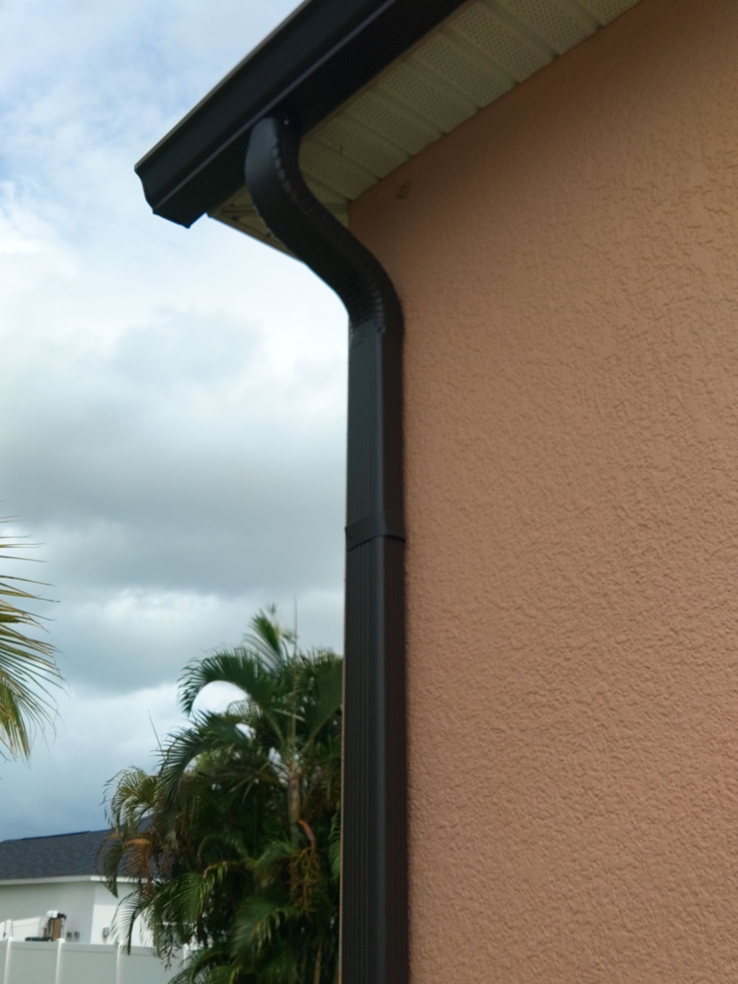 Downspout Installation for Multi-Story Homes in Cape Coral FL by Gutter Professors