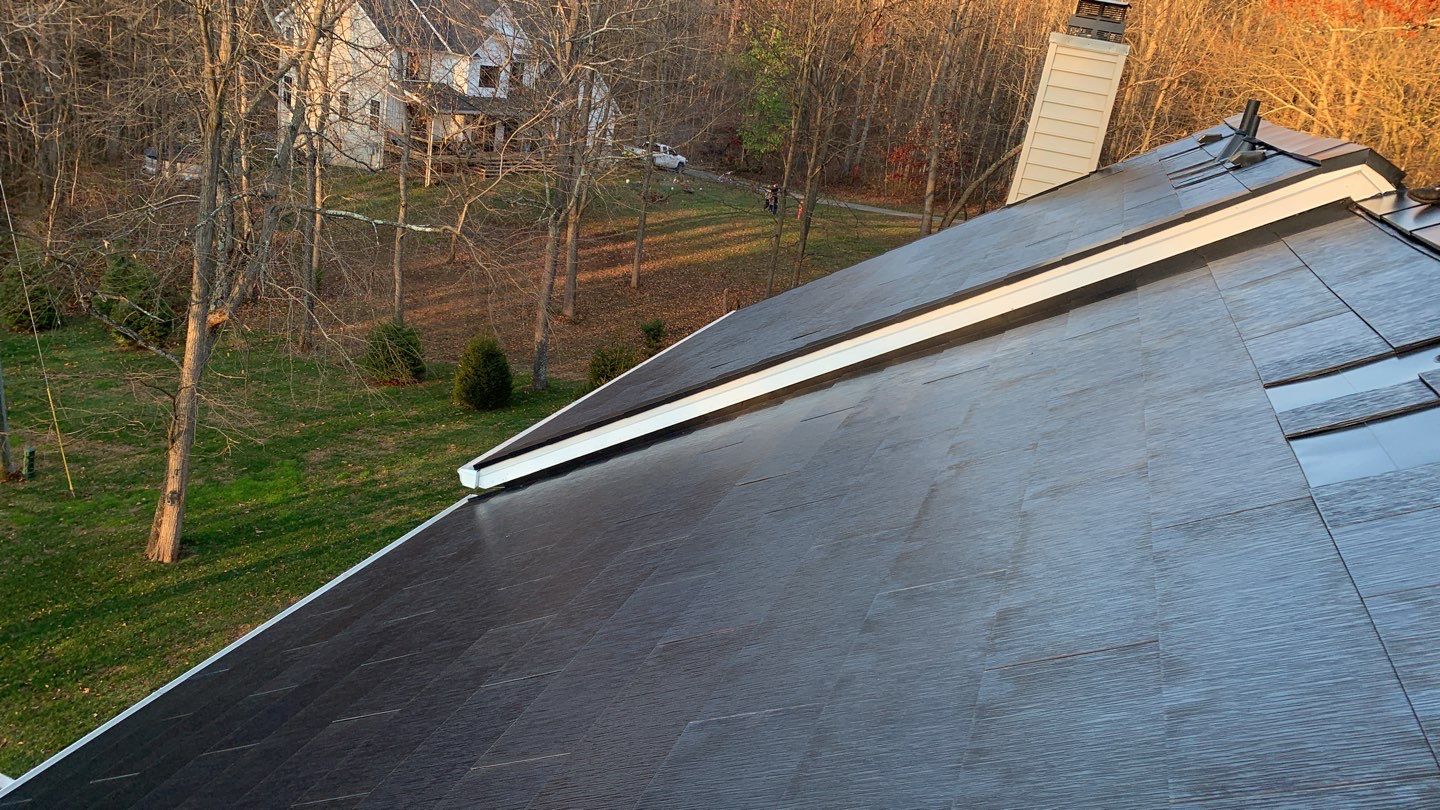 Tesla Solar Roof Replacement by American Home Contractors