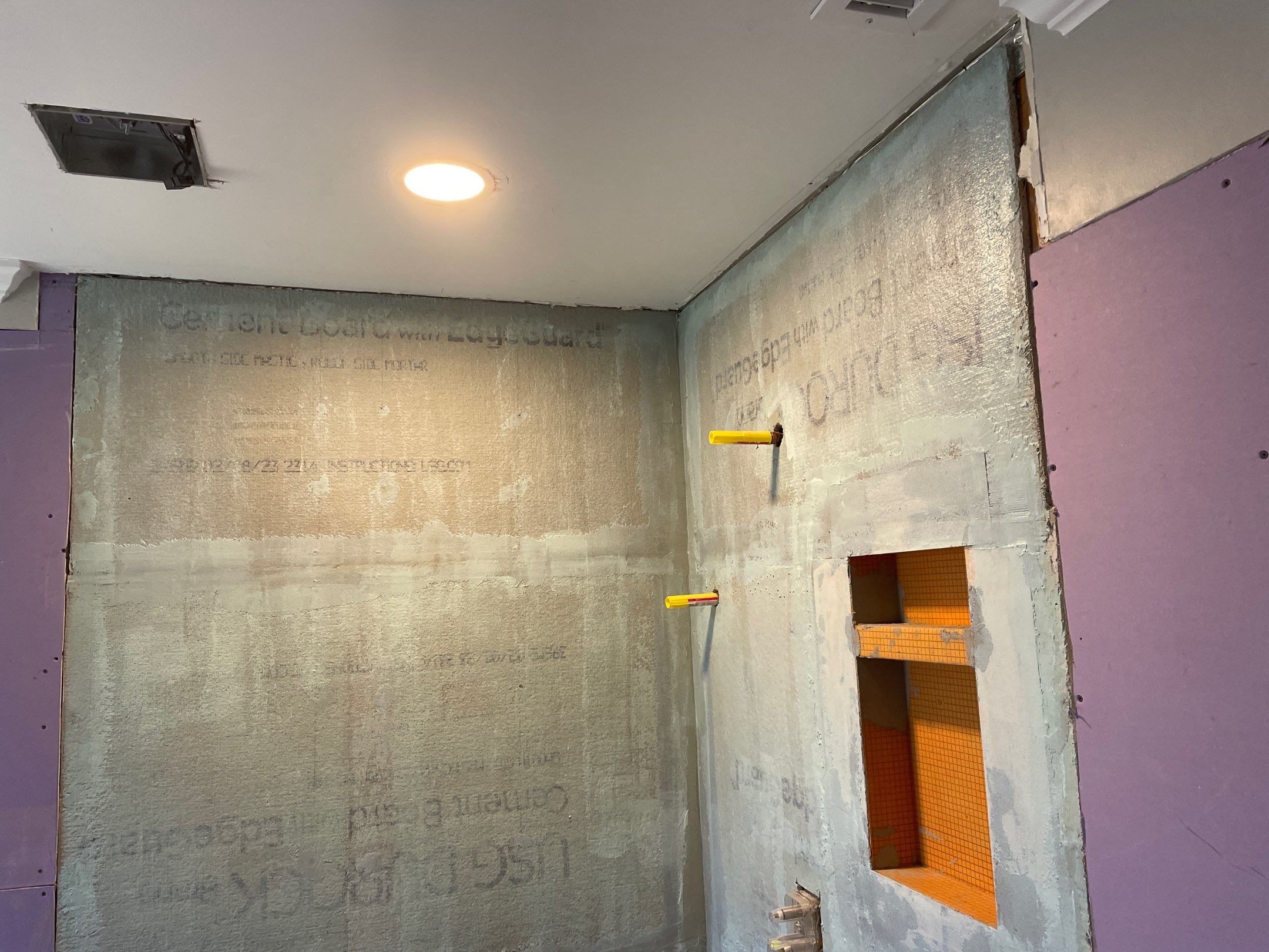 Bathroom Remodel using Schluter by Footprints Floors of Coastal Carolina
